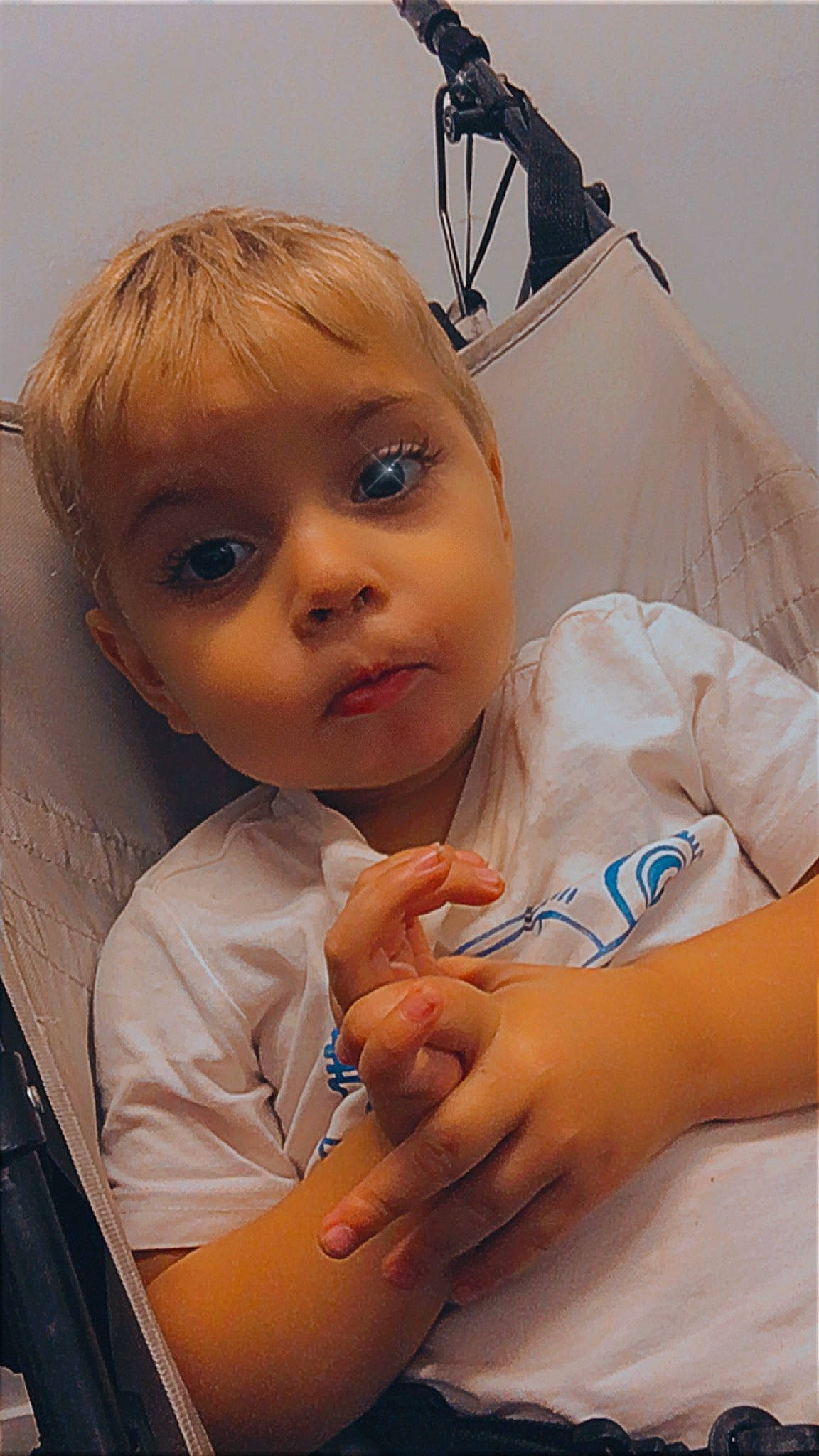 Cassius is registered to the contest to win money with this photo: arm, baby, cheek, chin, dress, ear, eyebrow, eyelash, finger, gesture, hand, happy, human_body, iris, lip, mouth, nose, person, skin, sleeve