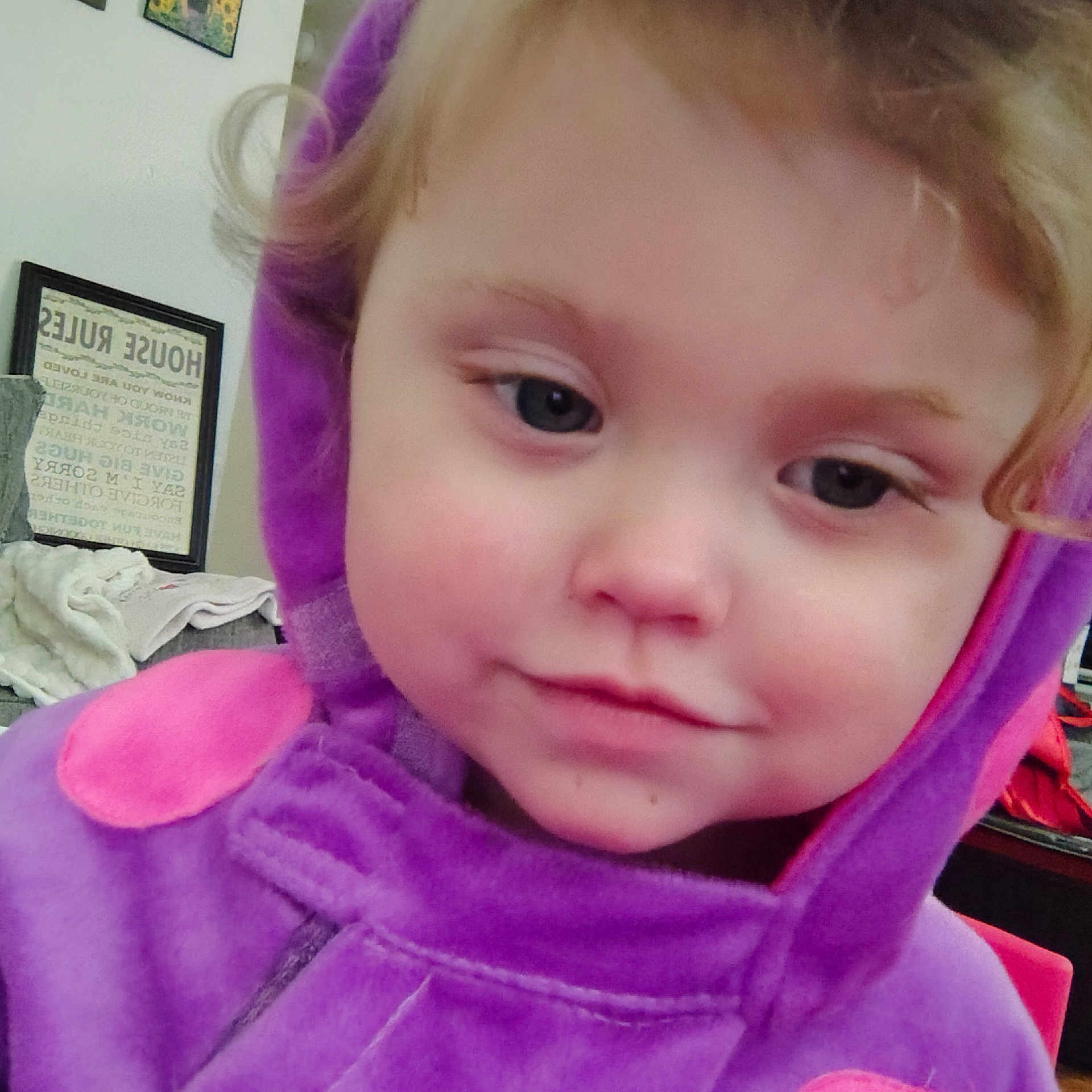 Kinleigh joined the competition — help win amazing prizes! child, toddler, purple_hoodie, pink_spots, face, indoors, expression, curly_hair, clothing, portrait, young, cute, cozy, motivation_poster, soft_fabric, warm, casual, smile, closeup, person