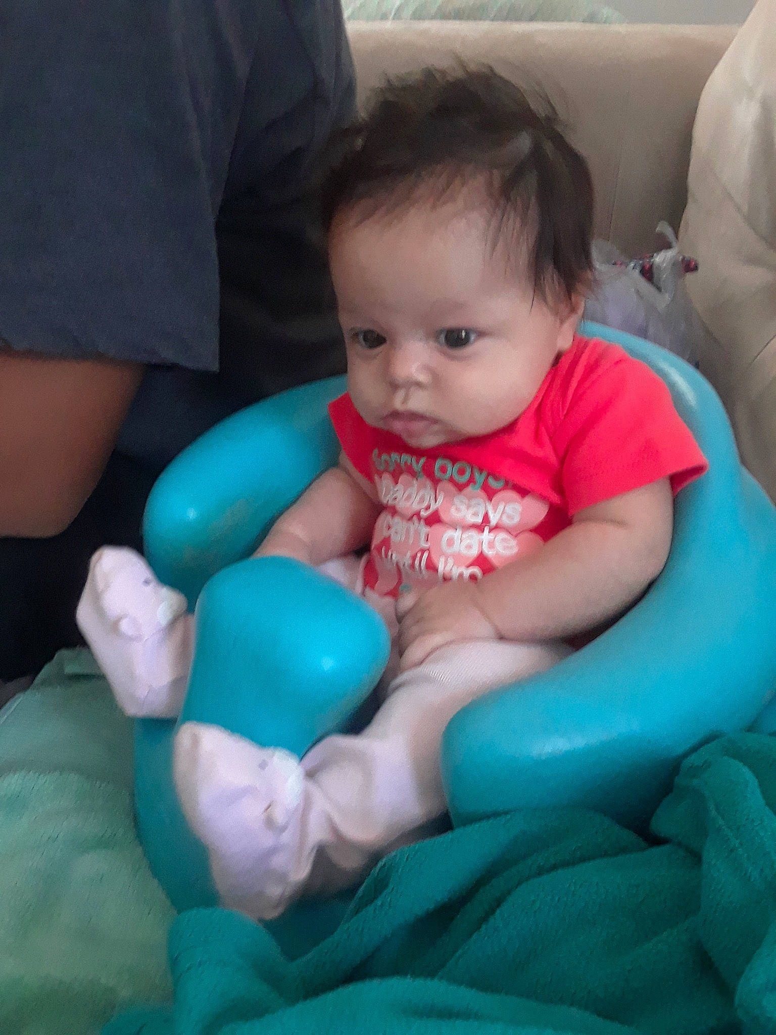 Leila is registered to the contest to win money with this photo: arm, blue, boy, cheek, child, day, finger, fun, girl, hand, head, infant, leg, mouth, person, play, product, sitting, skin, smile