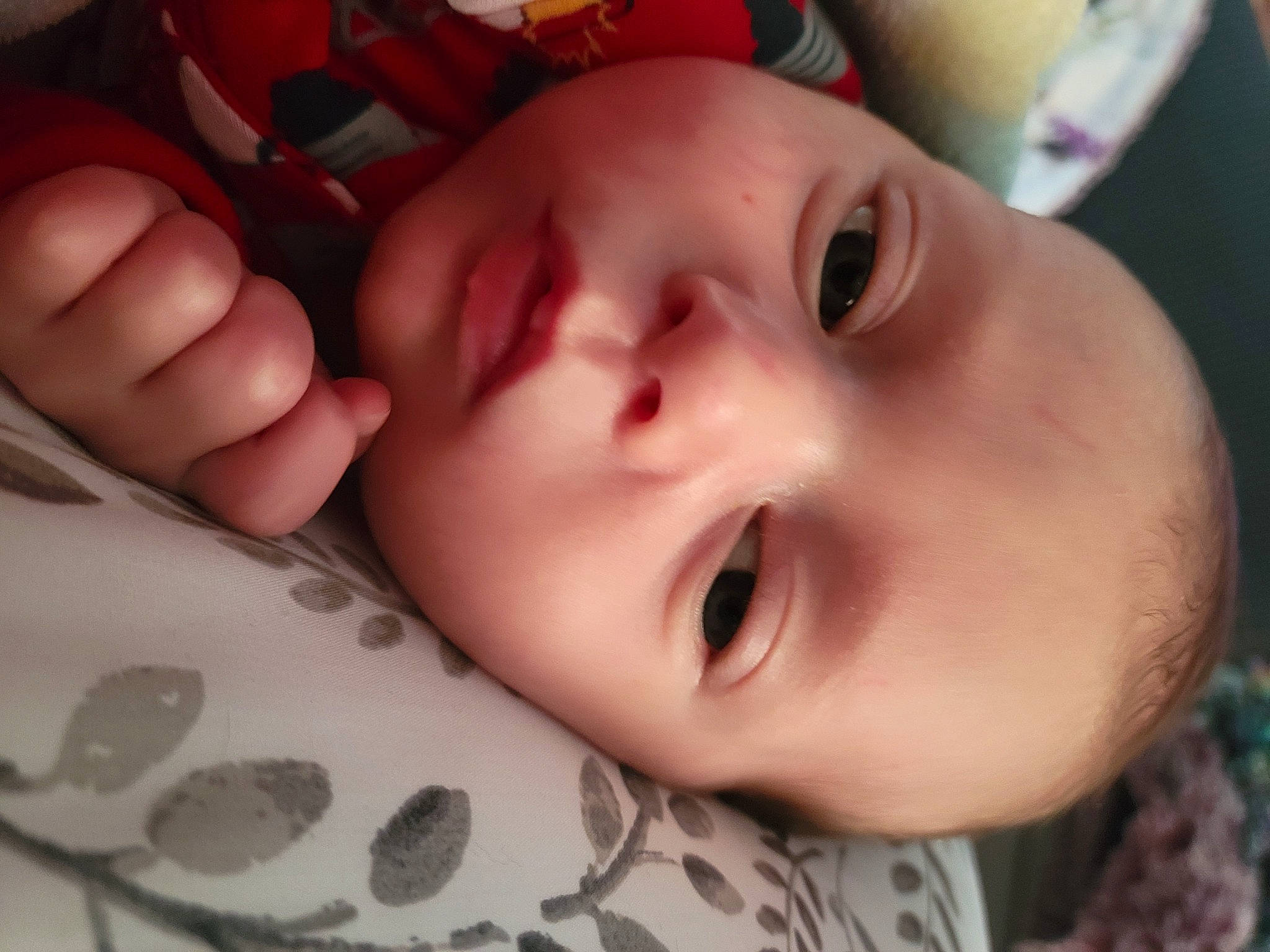 Pierson is registered to the contest to win money with this photo: arm, baby, cheek, chin, ear, eye, eyebrow, eyelash, forehead, gesture, hand, human_body, iris, lip, mouth, neck, nose, person, skin, smile