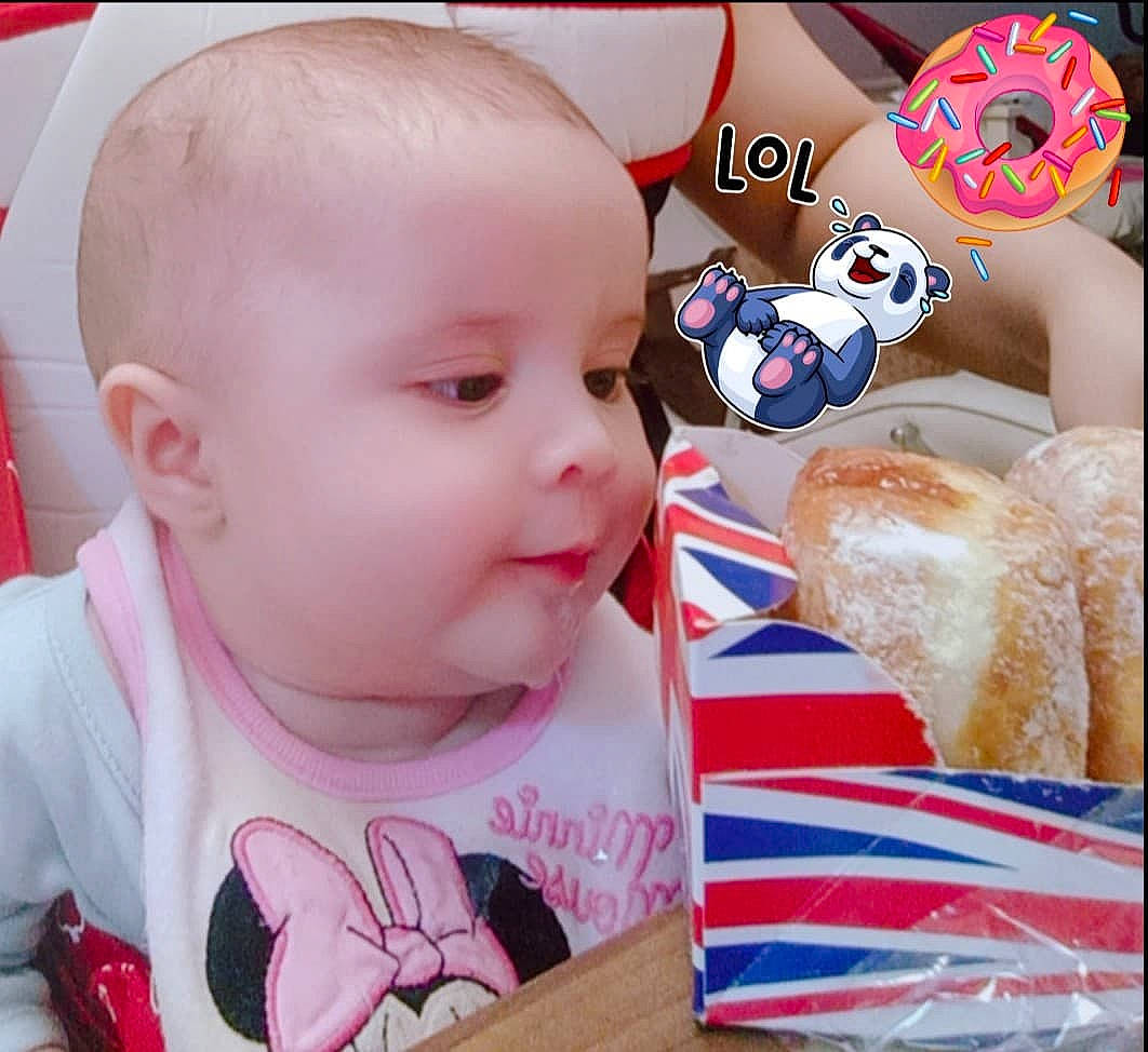 Cassi is registered to the contest to win money with this photo: baby, cheek, child, comfort_food, cool, ear, eating, eye, face, food, head, lip, mouth, nose, person, photo_caption, play, skin, toddler