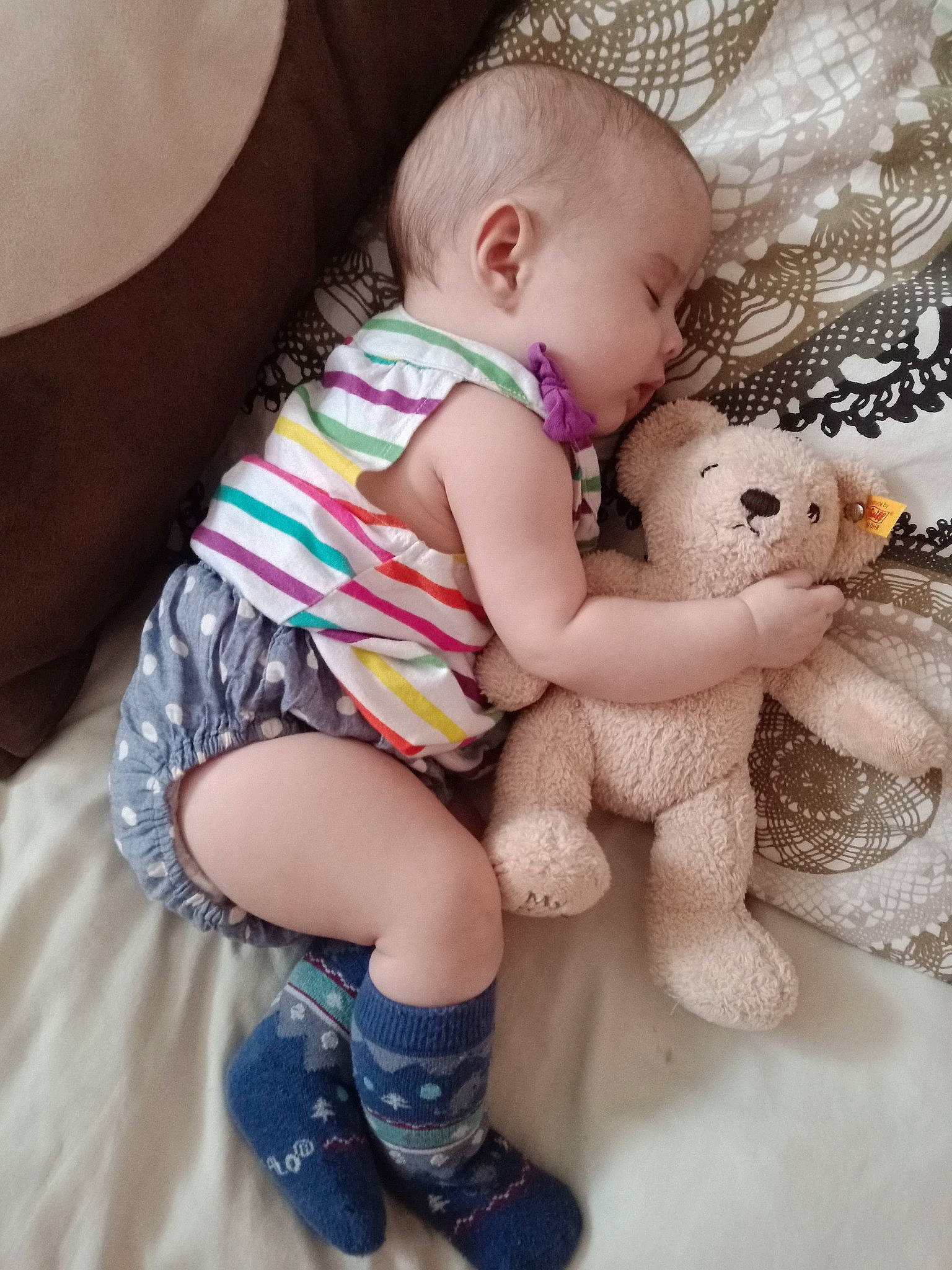 Cassi is registered to the contest to win money with this photo: baby, baby_toddler_clothing, cheek, child, hand, interaction, leg, person, pink, product, sibling, skin, stuffed_toy, teddy_bear, toddler, toy, yellow