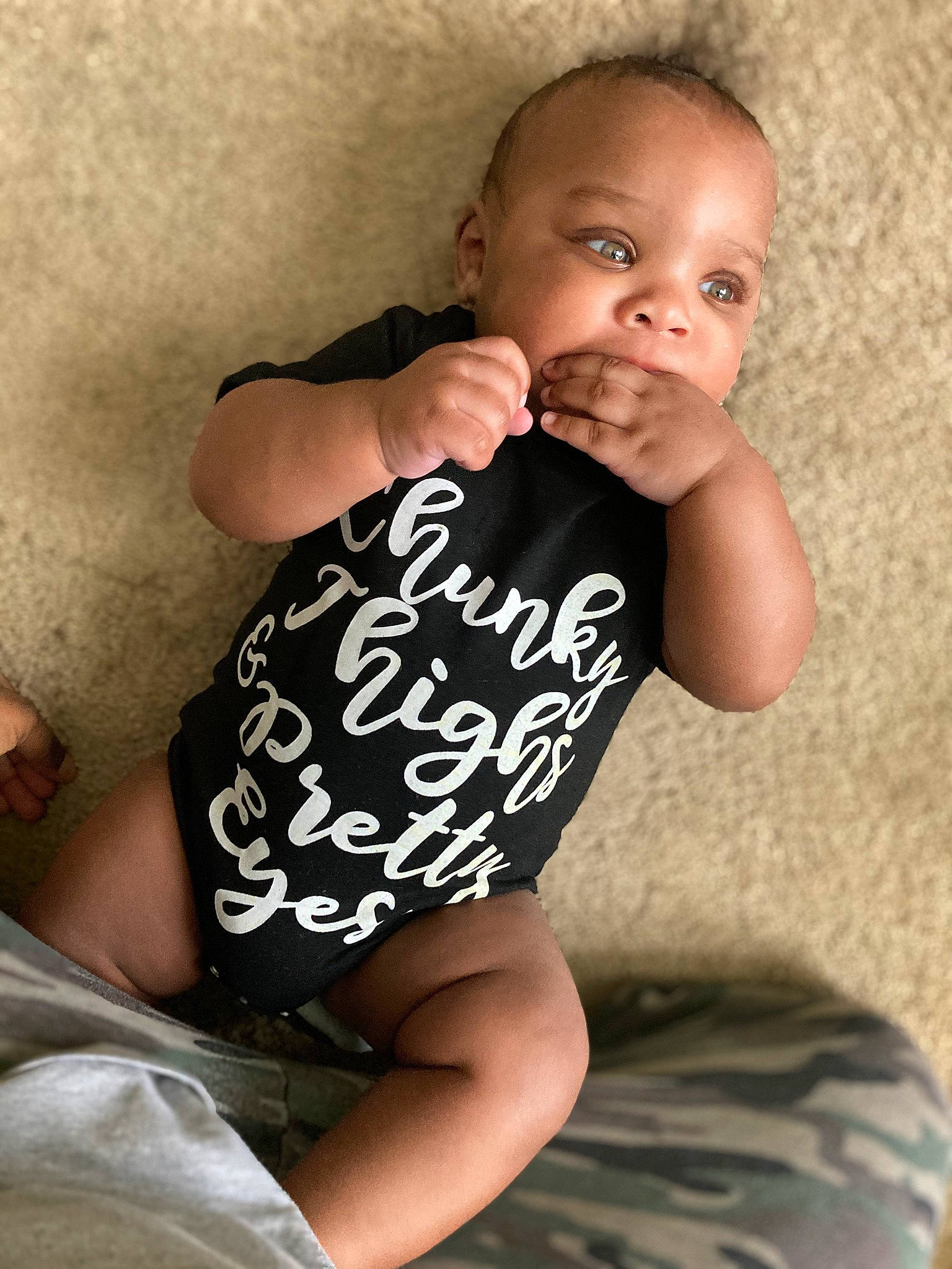 Dario Ruffin is registered to the contest to win money with this photo: baby, baby_toddler_clothing, comfort, dress, eye, face, flash_photography, gesture, hair, happy, head, human_body, iris, lip, mouth, neck, person, shoulder, skin, sleeve