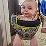 Lakely joined the competition — help win amazing prizes! baby, carpet, child, colorful_pattern, curious_expression, cute, door_frame, face, floor_transition, home_interior, indoor, jumper, legs, owl_pattern, person, pink_clothing, pout, slippers, suspenders, wooden_floor