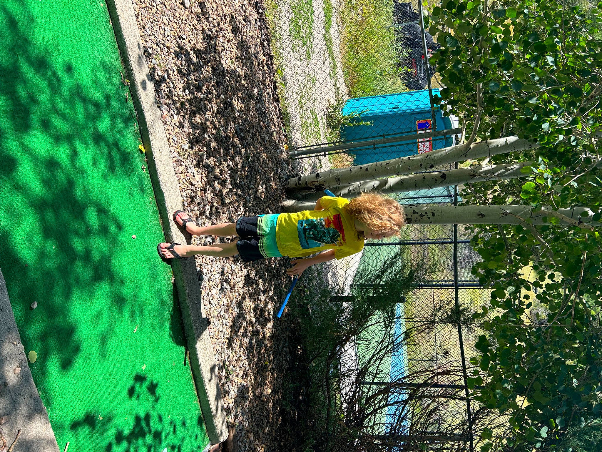 Bennett joined the competition — help win amazing prizes! art, biome, branch, electric_blue, forest, fun, grass, green, jungle, leisure, people_in_nature, person, plant, shrub, soil, tree, trunk, wood