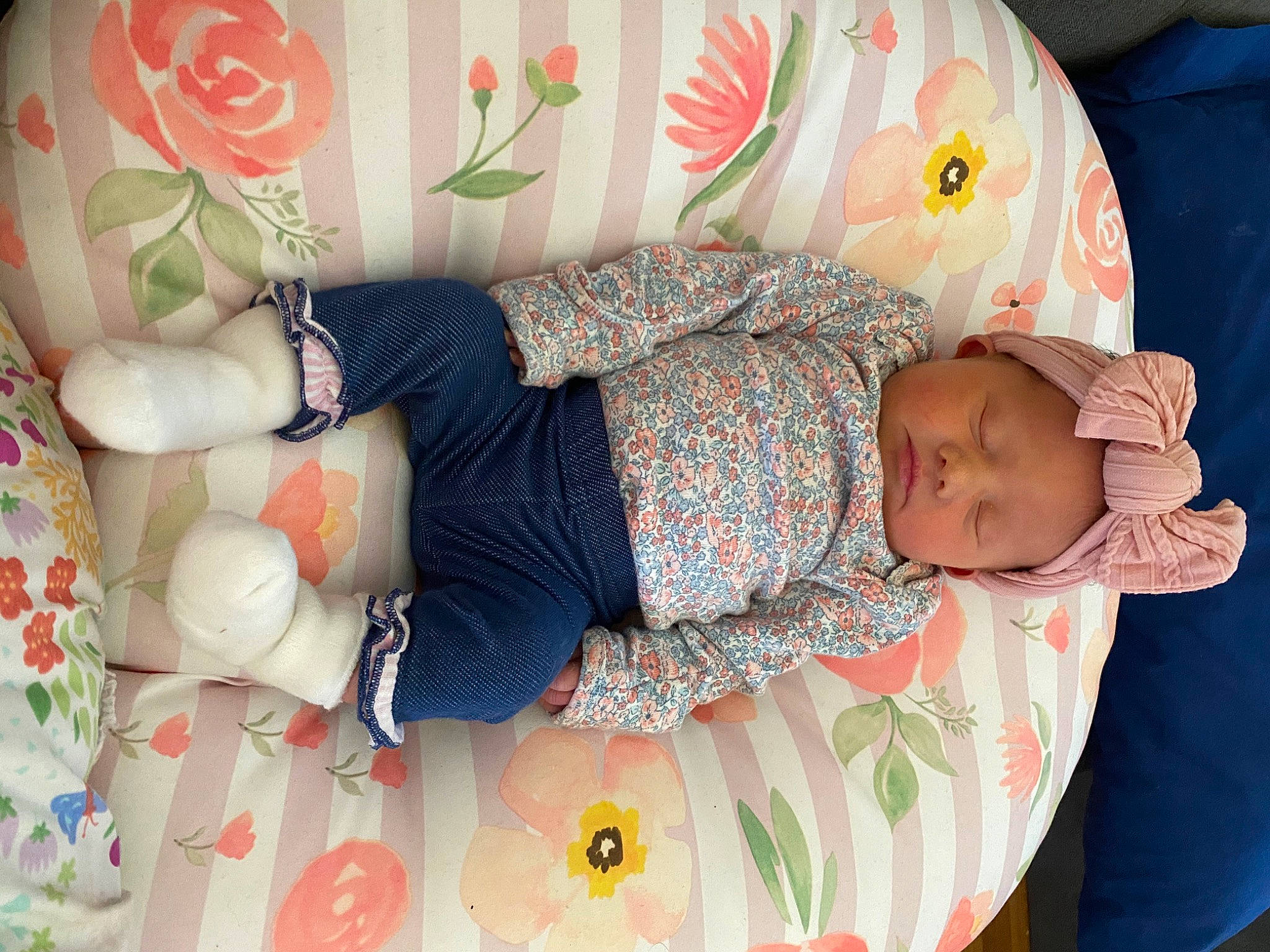 Anistyn is registered to the contest to win money with this photo: arm, baby, baby_products, baby_toddler_clothing, beauty, child, comfort, hand, head, headwear, linens, pattern, person, pink, plant, product, rose, skin, sleeve, textile