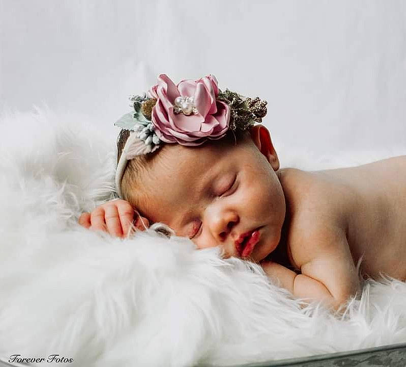 Anistyn joined the competition — help win amazing prizes! baby, baby_sleeping, baby_toddler_clothing, cap, comfort, eyebrow, eyelash, flower, hair_accessory, hand, happy, head, headband, headgear, headpiece, jewellery, linens, person, petal, skin