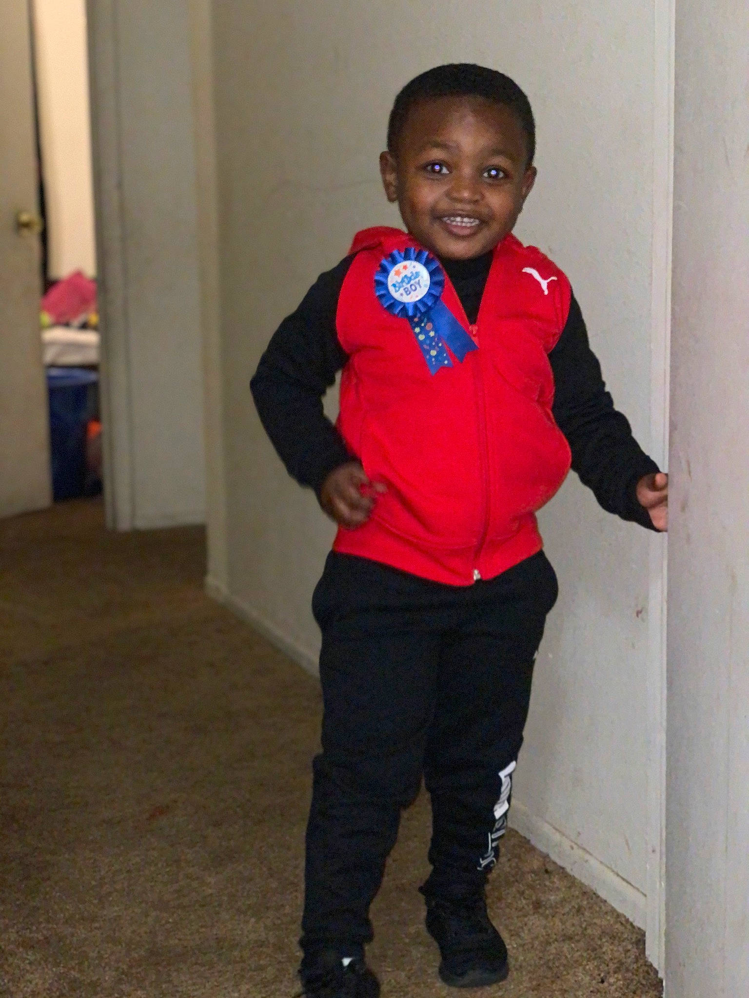 Jabari is registered to the contest to win money with this photo: blazer, collar, door, electric_blue, eye, face, formal_wear, fun, gesture, happy, joy, knee, neck, person, shoulder, sleeve, smile, sportswear, street_fashion, thumb