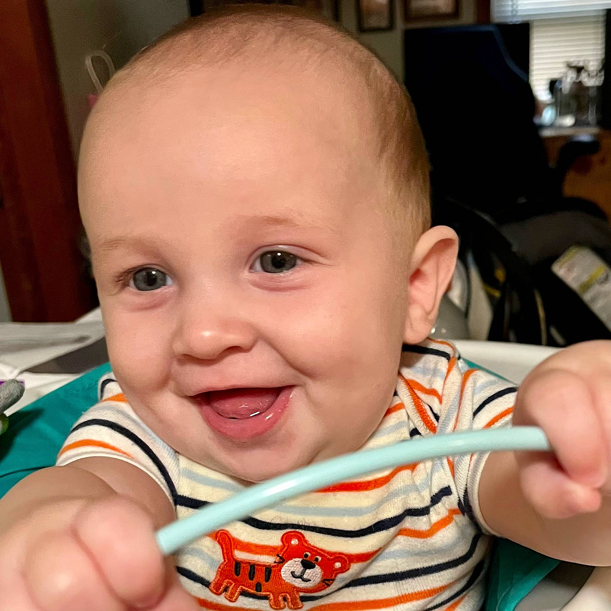 Kaiser is registered to the contest to win money with this photo: baby, baby_toddler_clothing, cheek, chin, ear, eye, eyebrow, face, finger, hand, happy, head, iris, joy, lip, mouth, nose, person, product, skin