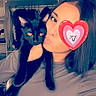 Sonic participe au concours pour gagner de l'argent avec cette photo : woman, person, cat, black_cat, pet, selfie, portrait, cuddling, heart_sticker, face, eyes, long_hair, clothing, closet, wardrobe, indoor, bedroom, black, cute, affection