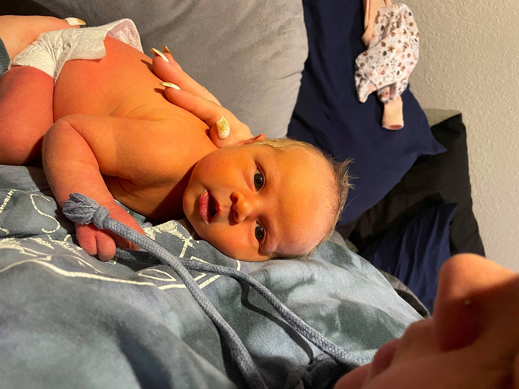 Calliope joined the competition — help win amazing prizes! abdomen, baby, bed, bedding, chest, comfort, ear, eye, eyebrow, eyelash, glasses, hand, hat, head, human_leg, linens, neck, nose, person, skin