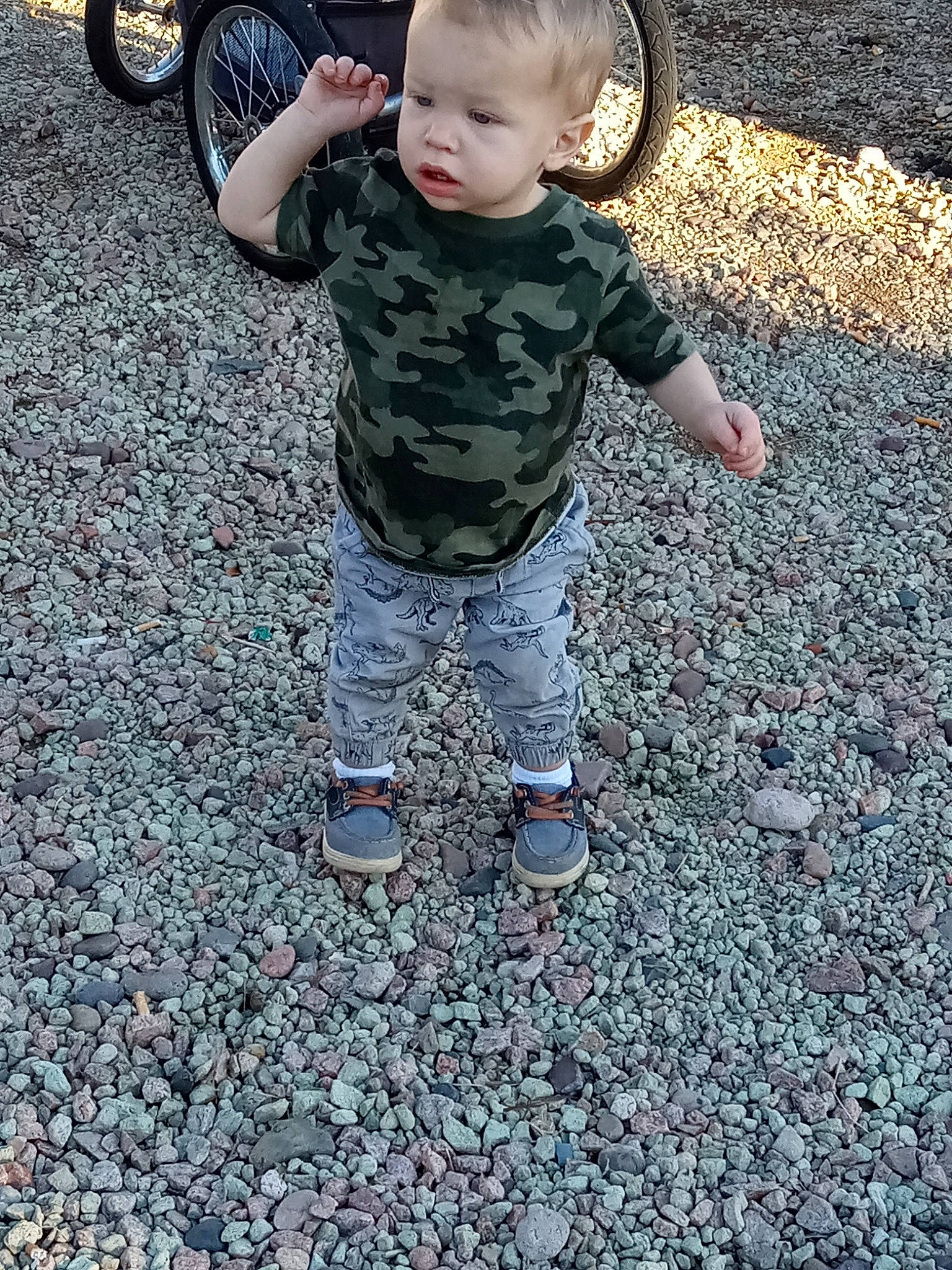 Christian joined the competition — help win amazing prizes! asphalt, automotive_tire, baby, baby_toddler_clothing, child, fun, grass, head, military_camouflage, pattern, people, people_in_nature, person, play, sitting, sleeve, sneakers, soil, tire, toddler