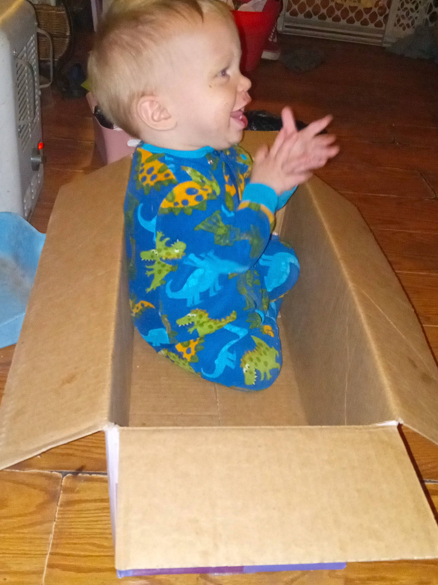 Christian joined the competition — help win amazing prizes! baby, baby_toddler_clothing, box, chair, child, floor, flooring, fun, hardwood, human_leg, paper_product, person, plywood, room, sitting, skin, standing, t_shirt, toddler, wood