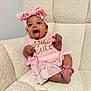 baby, chair, child, clothing, cozy, cute, furniture, happy, headband, indoor, infant, person, pink_bow, pink_dress, portrait, sitting, skin, smiling, tongue_out, tutu_cute