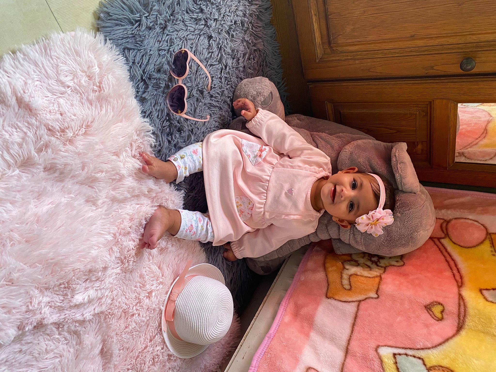 Anmol a rejoint le concours — aidez-le/la à gagner de superbes lots ! beauty, bed, child, comfort, doll, event, fashion_design, flooring, fun, hardwood, hat, headwear, human, joy, leisure, linens, mammal, person, pink, textile