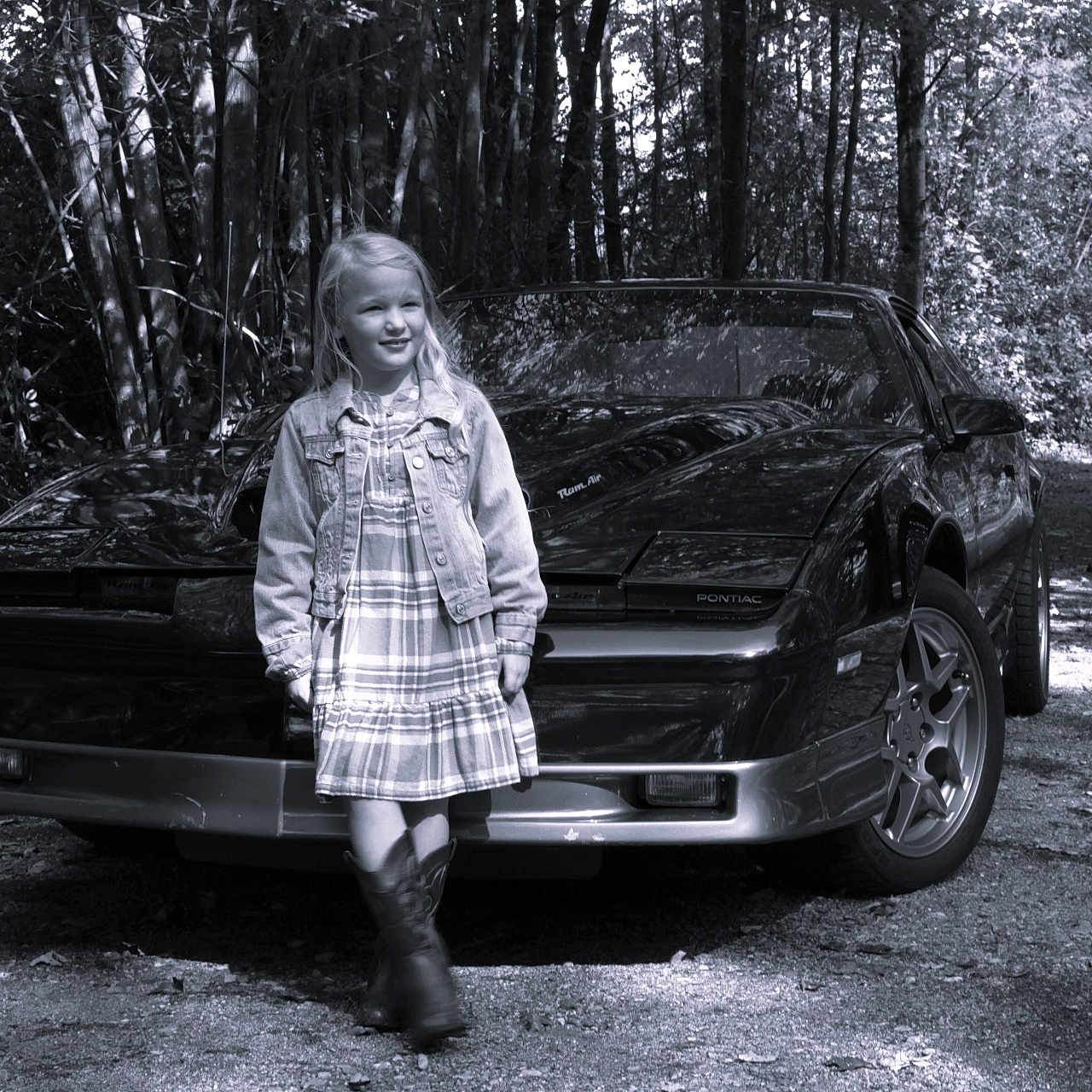 Audrey is registered to the contest to win money with this photo: alloywheel, car, carwheel, child, clothing, coat, face, female, footwear, girl, head, machine, person, plant, spoke, tire, transportation, tree, vehicle, wheel