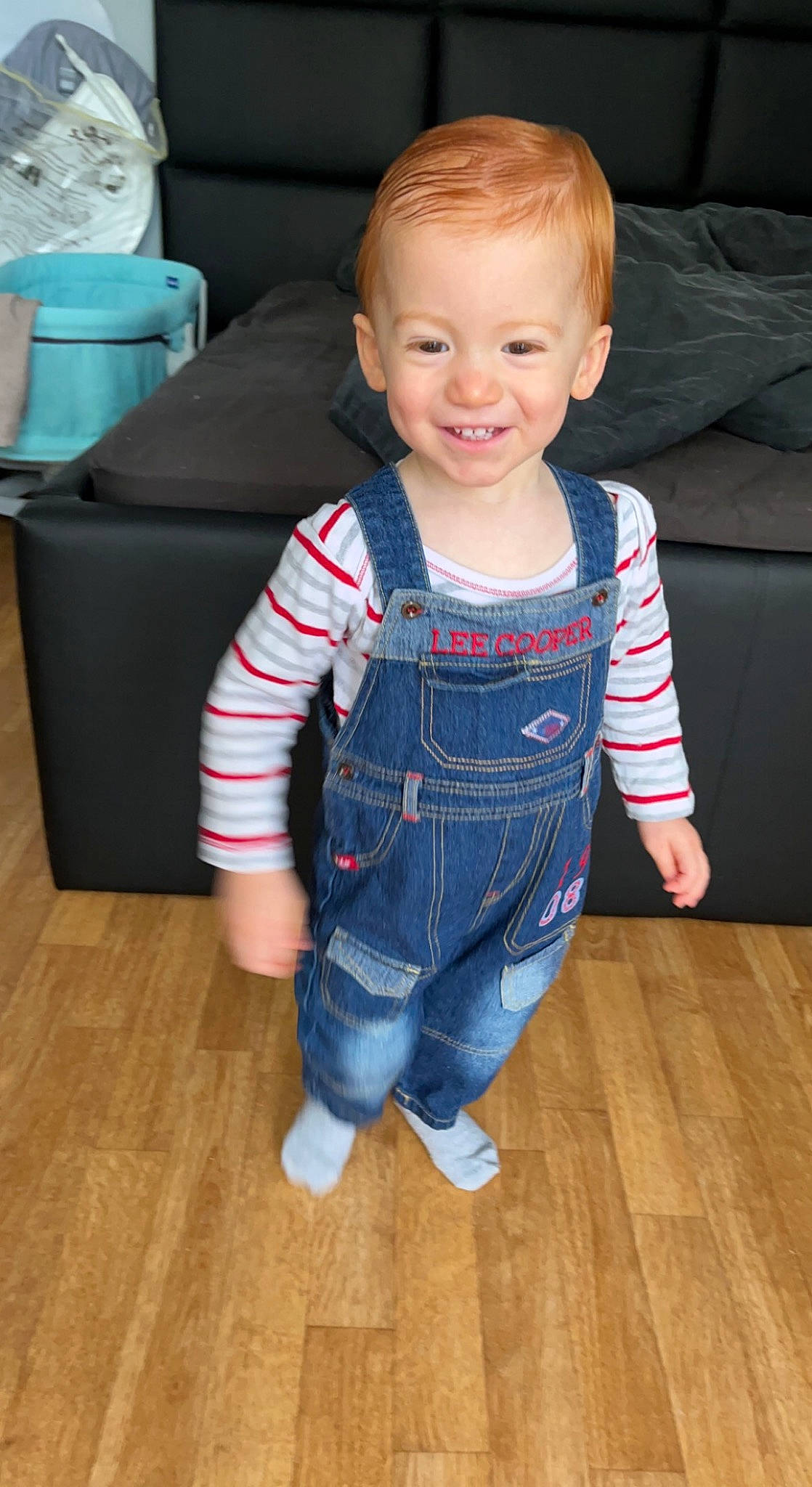 Nolann participe au concours pour gagner de l'argent avec cette photo : baby_toddler_clothing, cheek, chin, comfort, couch, eye, face, floor, flooring, hair, head, iris, jeans, joy, leg, person, skin, sleeve, smile, standing