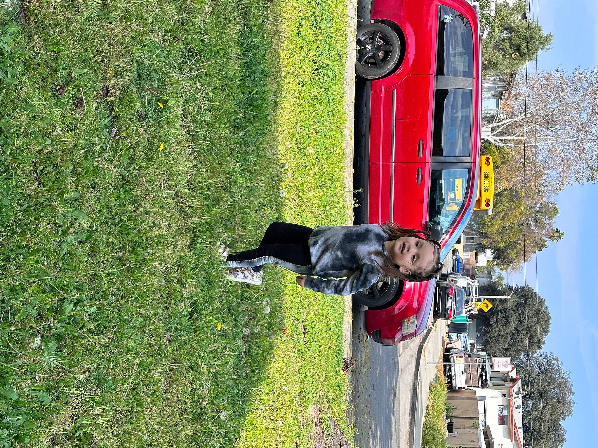 Priscilla joined the competition — help win amazing prizes! auto_part, automotive_exterior, automotive_lighting, automotive_wheel_system, building, bumper, car, grass, leisure, motor_vehicle, person, plant, public_utility, sky, street_light, tire, tree, vehicle, vehicle_door, wheel