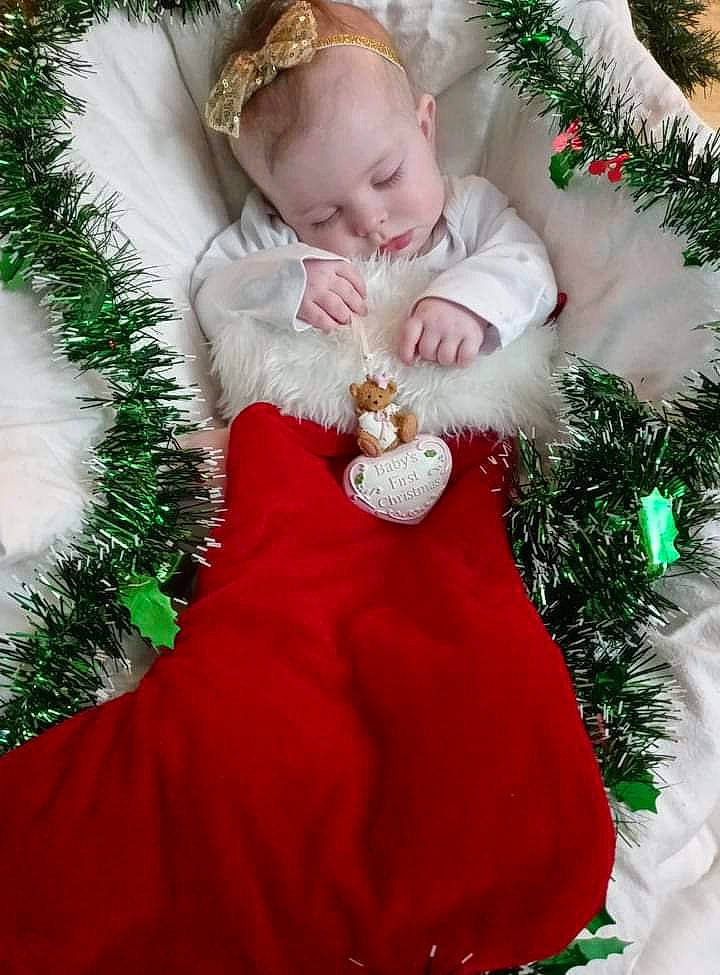 Savannah joined the competition — help win amazing prizes! baby, baby_toddler_clothing, christmas, christmas_decoration, christmas_eve, christmas_ornament, christmas_tree, conifer, costume_hat, event, evergreen, fur_clothing, happy, hat, holiday, holiday_ornament, ornament, person, toddler, white