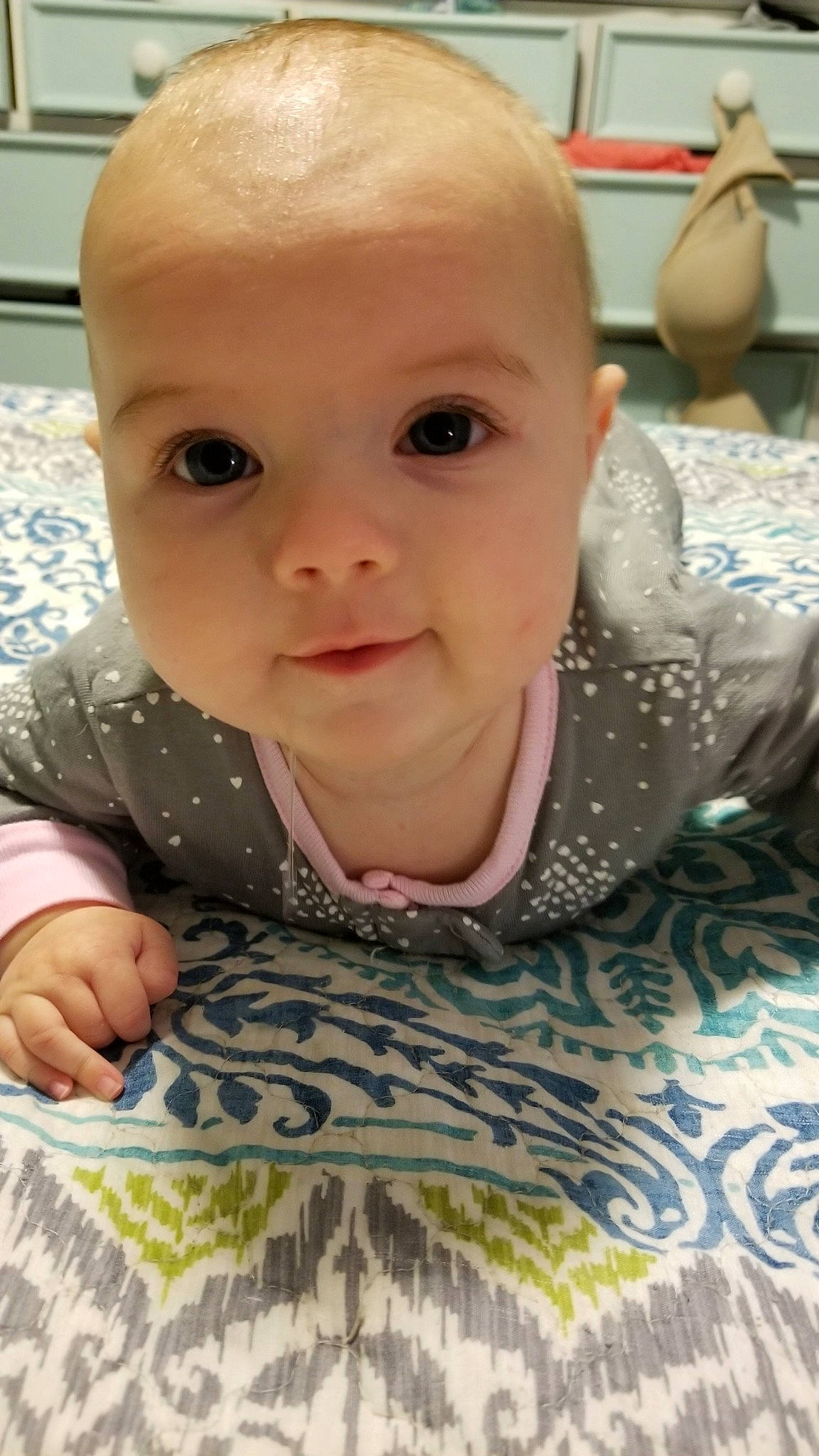 Elianna Grace is registered to the contest to win money with this photo: baby, cheek, child, chin, eye, face, forehead, head, iris, lip, mouth, nose, person, skin, smile, toddler, tummy_time