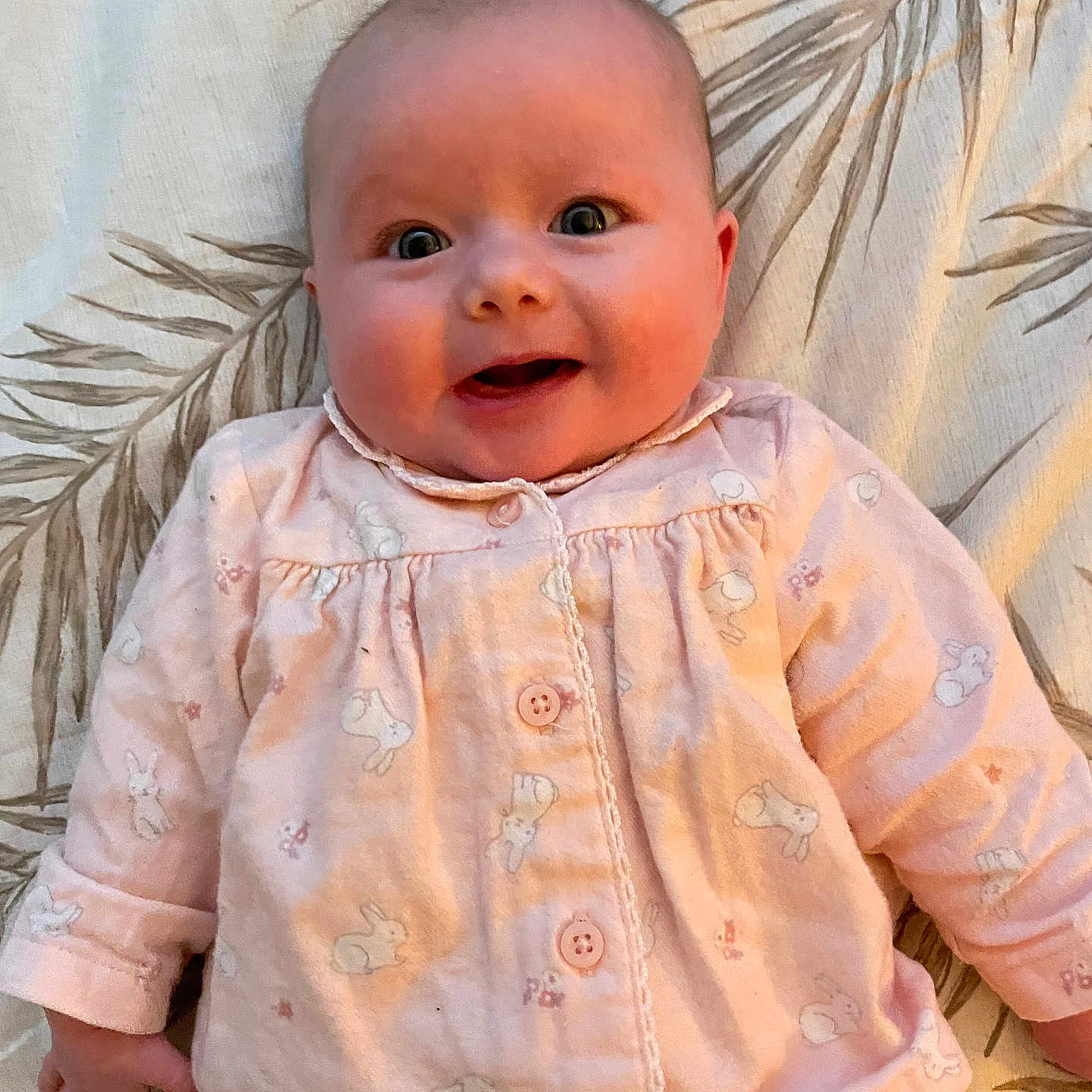 Amelia joined the competition — help win amazing prizes! baby, babylaughing, bodypart, clothing, dress, face, finger, hand, happy, head, longsleeve, newborn, pants, person, photography, portrait, shirt, sitting, sleeve, smile