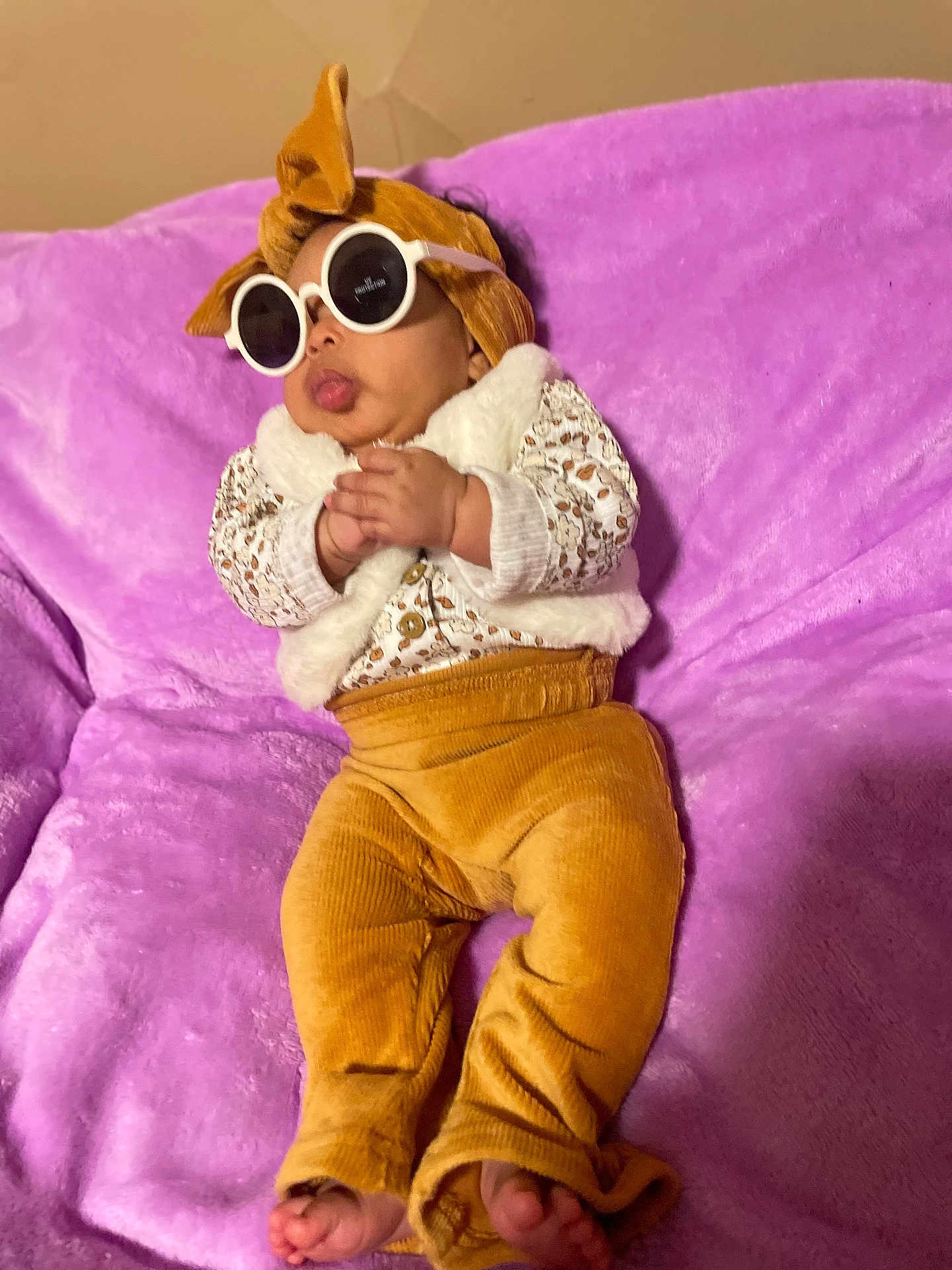 Myhitrice joined the competition — help win amazing prizes! baby, sunglasses, headwrap, purple_blanket, mustard_pants, vest, patterned_top, bare_feet, cozy, cute, infant, fashion, relaxed, indoor, plush, child, portrait, accessory, clothing, casual