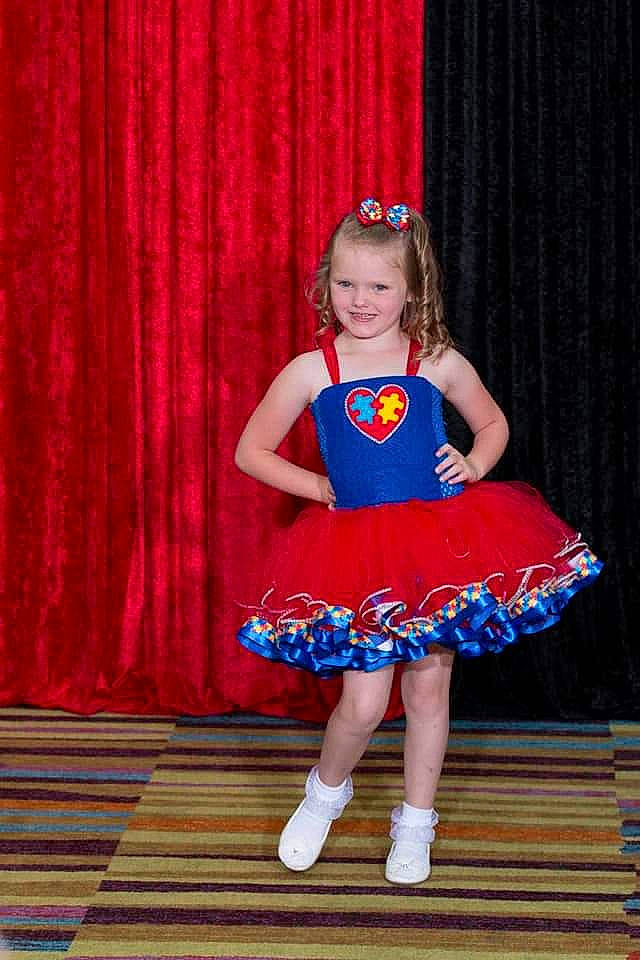 Hannah joined the competition — help win amazing prizes! baby_toddler_clothing, curtain, day_dress, dress, electric_blue, entertainment, event, fashion_design, happy, human_leg, joy, leg, magenta, one_piece_garment, performing_arts, person, pink, purple, shoe, smile