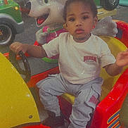 Zyere joined the competition — help win amazing prizes! toddler, child, kiddie_ride, car, arcade, amusement, cartoon_mouse, colorful, indoor, people, toy, steering_wheel, play, fun, casual_clothing, pants, tshirt, shoes, entertainment, family