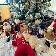 Christian participe au concours pour gagner de l'argent avec cette photo : baby, blanket, celebration, child, christmas_lights, christmas_tree, cozy, decorations, festive, holiday, holiday_gifts, indoor, infant, ornaments, plush_reindeer, presents, santa_claus_costume, santa_doll, toy, winter