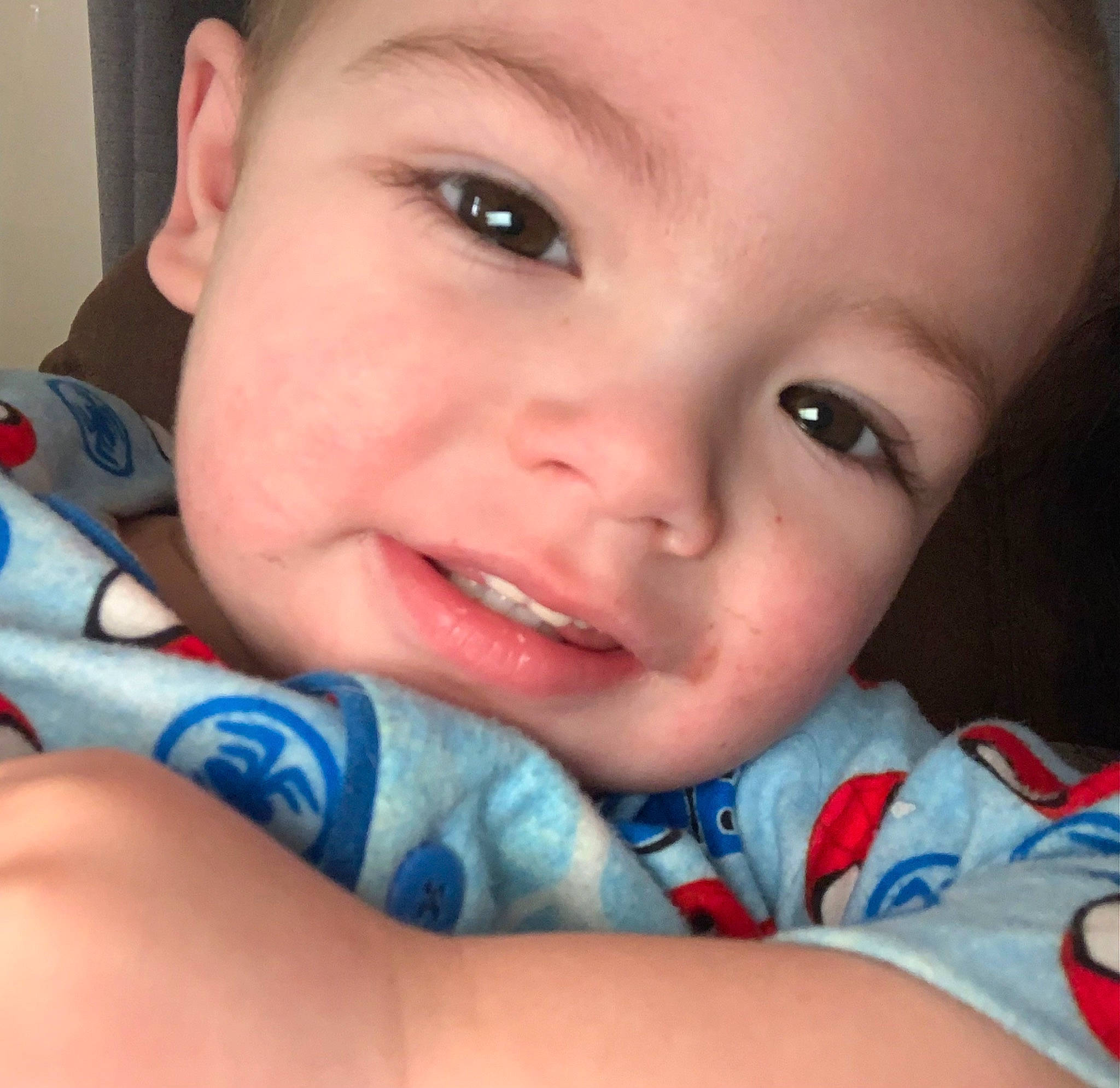 Jase is registered to the contest to win money with this photo: baby, blue, cheek, chin, ear, eye, eyebrow, eyelash, forehead, happy, human_body, jaw, lip, mouth, muscle, neck, nose, person, skin, sleeve