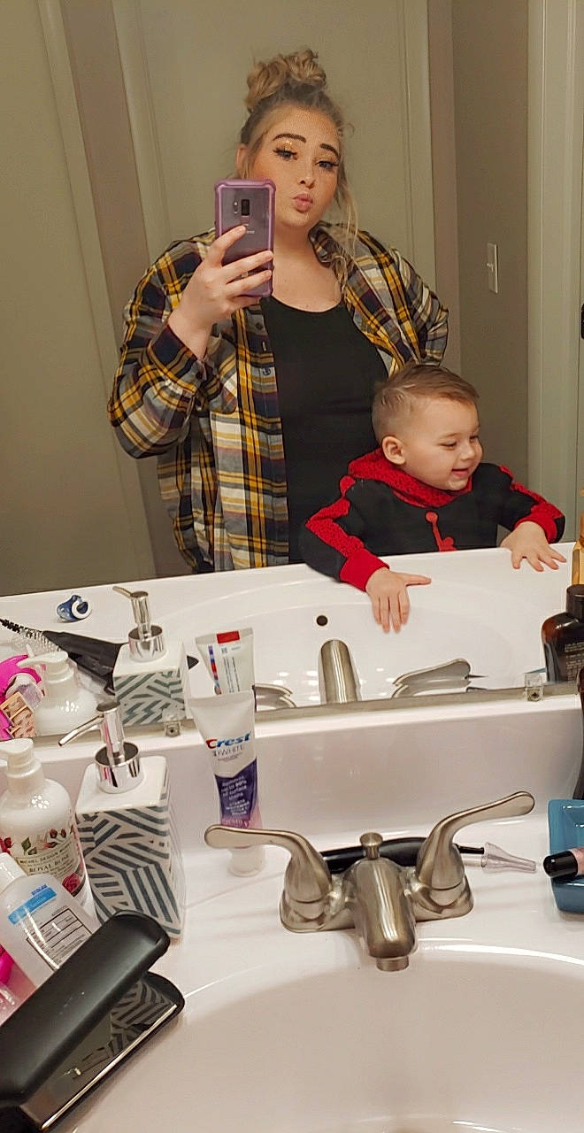 Arrow joined the competition — help win amazing prizes! baby, bathroom, beauty, event, eyewear, fashion_design, mirror, paper_towel, person, personal_care, photograph, plaid, plastic_bottle, plumbing_fixture, room, sink, t_shirt, tap, tartan, toddler