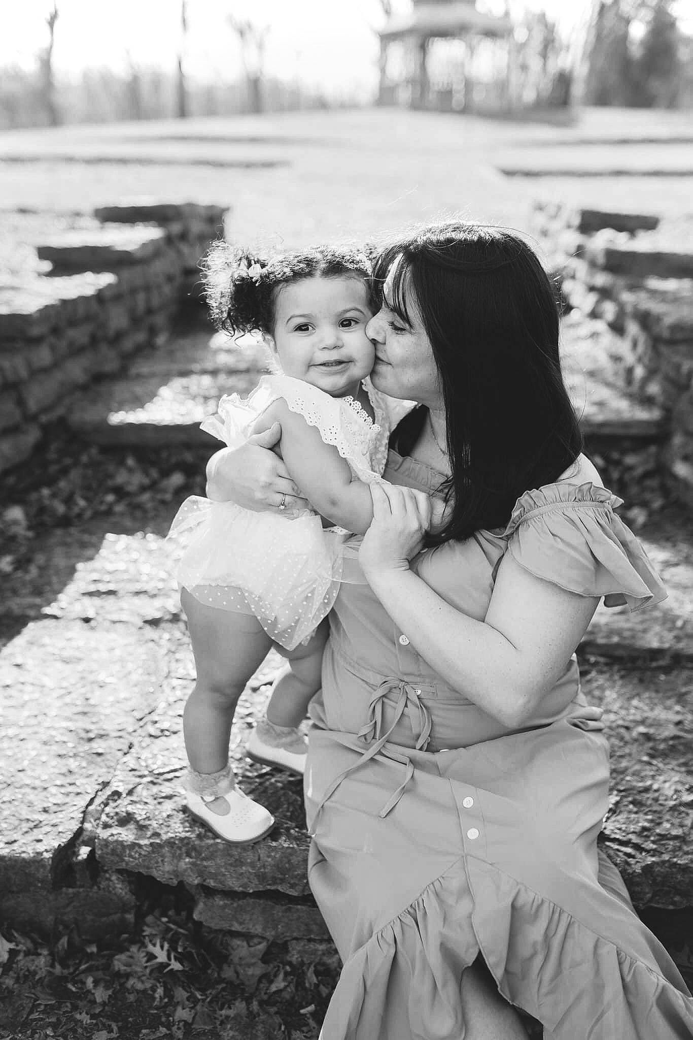 Amayah is registered to the contest to win money with this photo: black_and_white, bridal_clothing, child, dress, event, eye, flash_photography, fun, gesture, grass, hair, happy, monochrome, monochrome_photography, people_in_nature, person, photograph, smile, standing, style