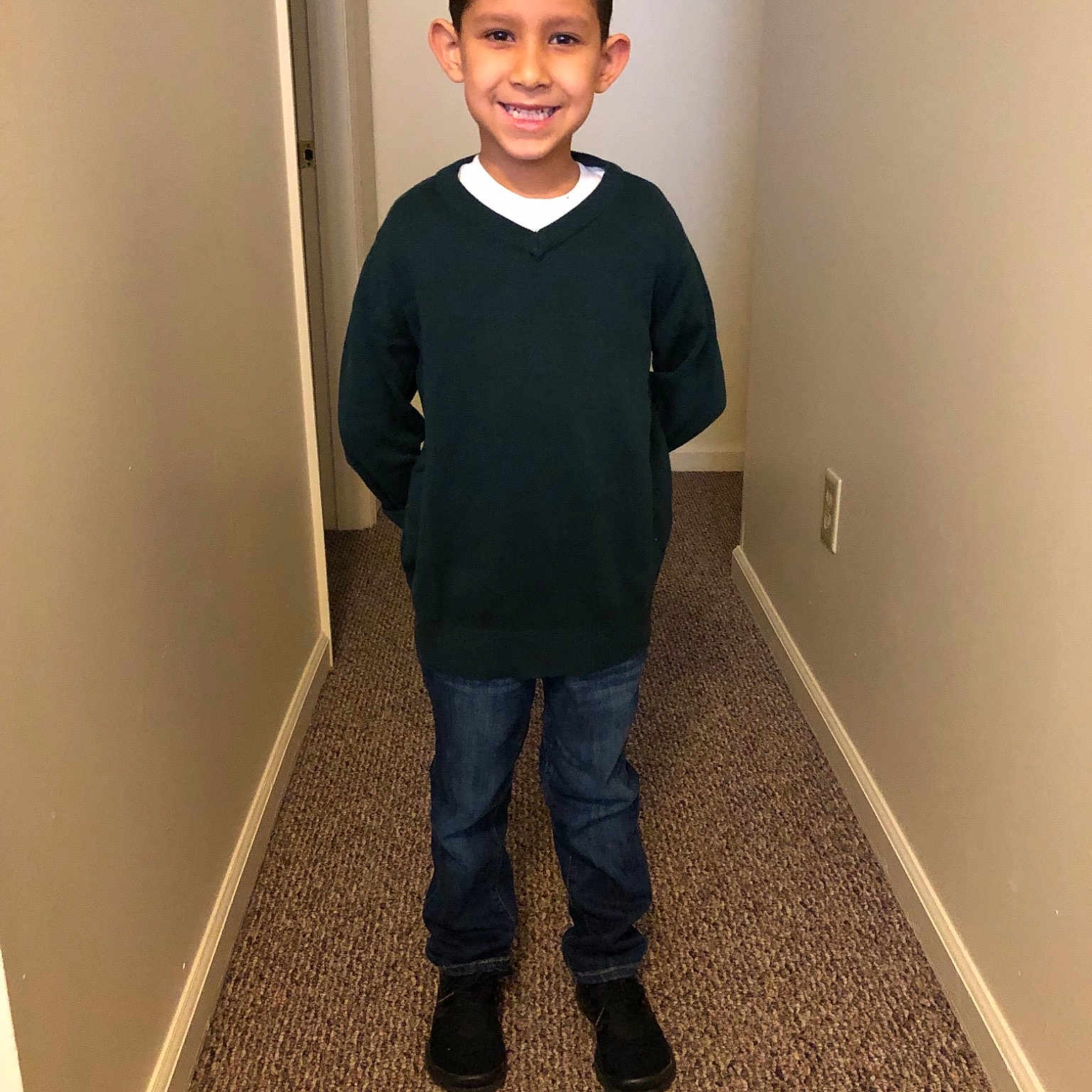 Manny joined the competition — help win amazing prizes! child, door, floor, flooring, joy, outerwear, person, shoe, standing, toddler