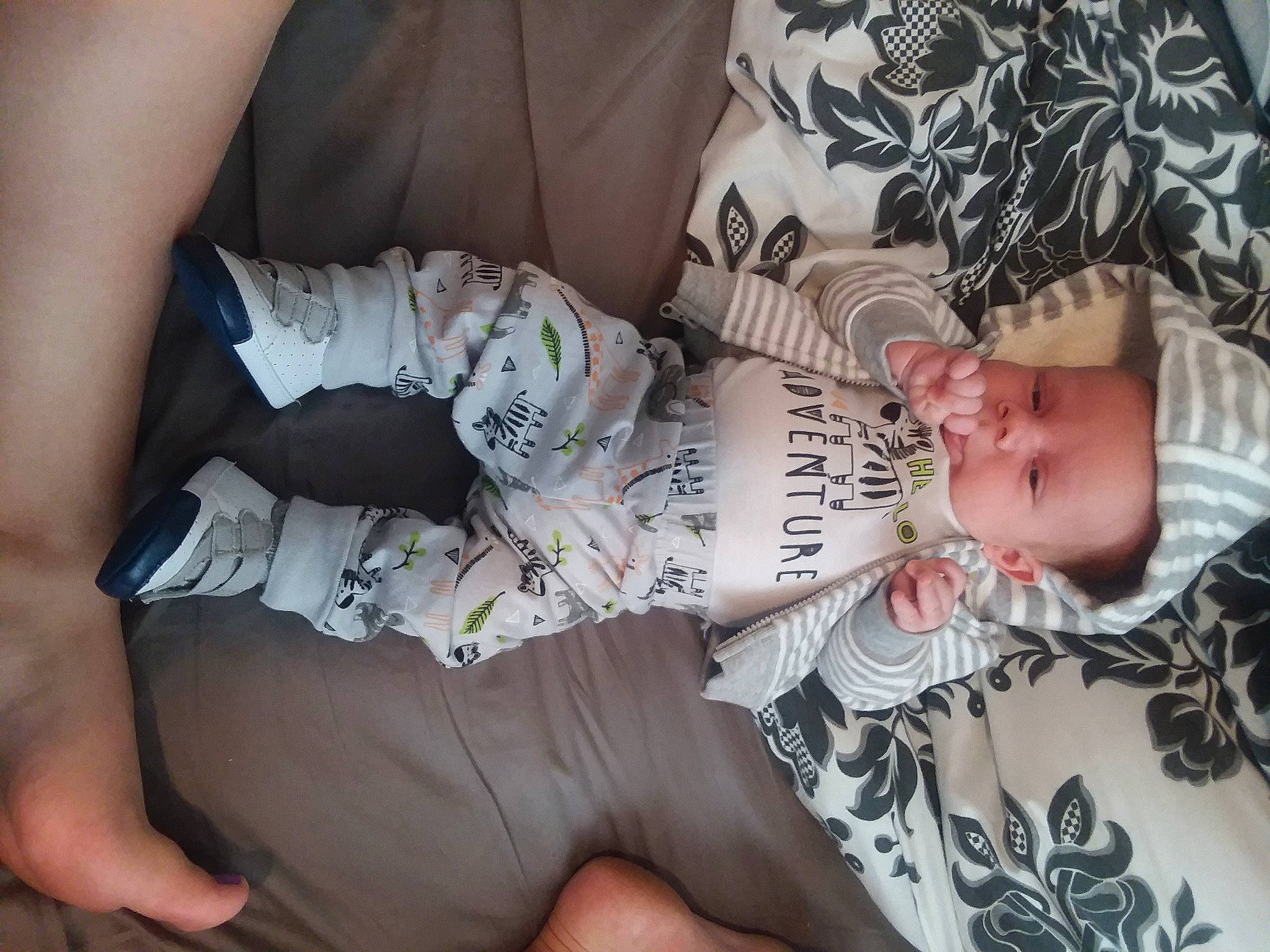 Perry is registered to the contest to win money with this photo: baby, child, hand, leg, nap, person