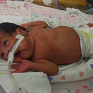 Xiomara joined the competition — help win amazing prizes! baby_products, bed, bedtime, cheek, child, childbirth, ear, finger, girl, hand, infant, infant_bed, mouth, nap, nose, product, sleep, toddler