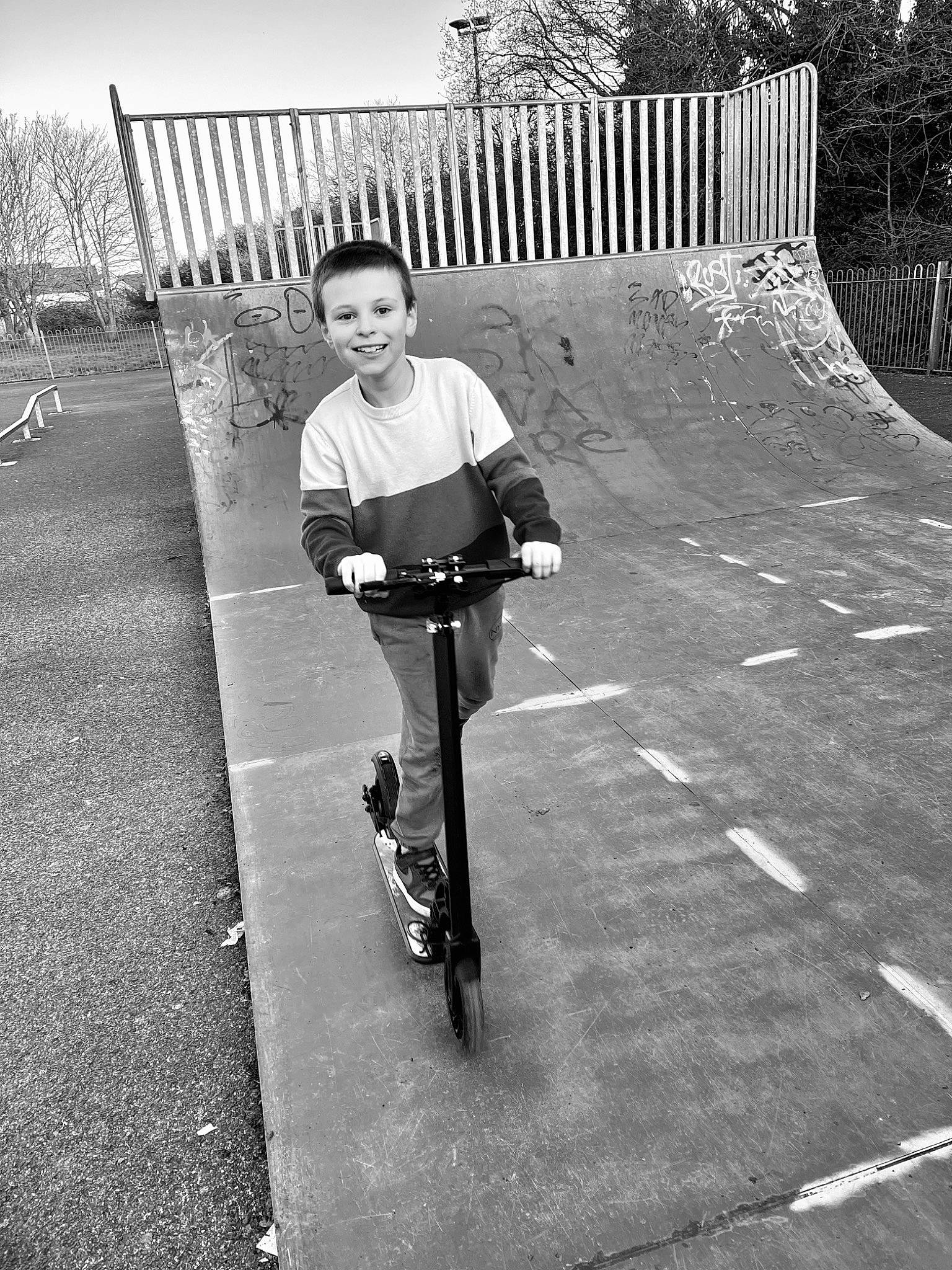 Keegan is registered to the contest to win money with this photo: asphalt, automotive_tire, bicycle, bicycle_frame, bicycle_handlebar, bicycle_tire, bicycle_wheel, cycling, joy, person, plant, recreation, road, road_surface, rolling, spoke, sports_equipment, style, tire, tree