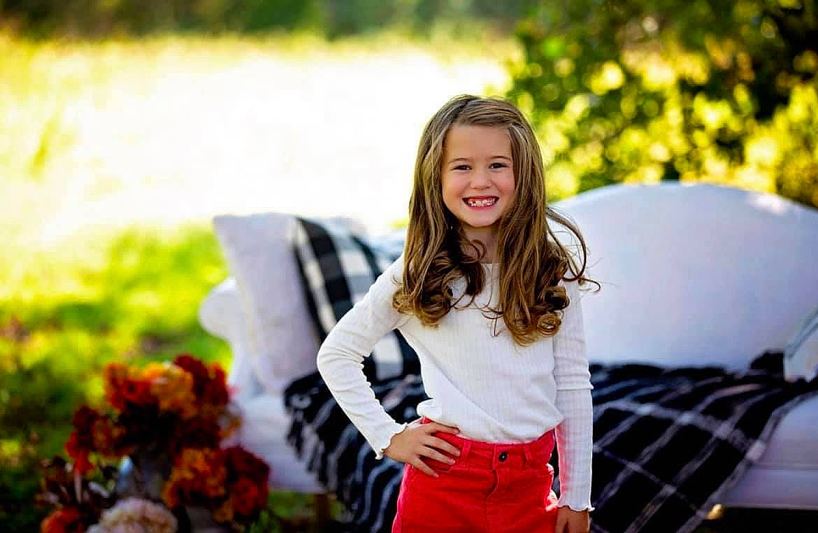 Khloe is registered to the contest to win money with this photo: beauty, flash_photography, fun, grass, hairstyle, happy, joy, leaf, leisure, orange, people, people_in_nature, person, photograph, plaid, plant, smile, street_fashion, sunlight, t_shirt