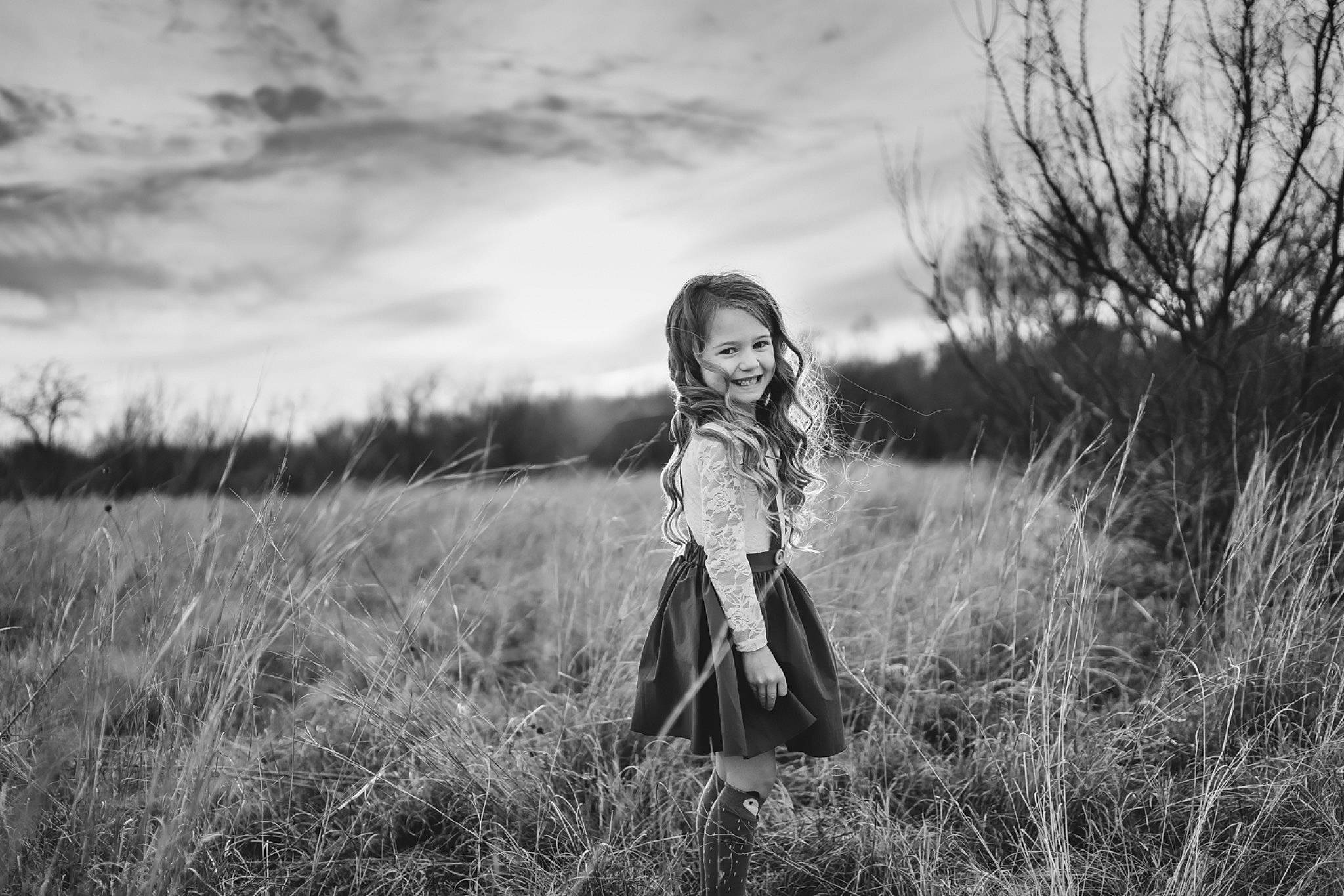 Khloe is registered to the contest to win money with this photo: black_and_white, cloud, field, flash_photography, grass, grass_family, grassland, happy, joy, landscape, long_hair, meadow, monochrome_photography, natural_landscape, people_in_nature, person, plant, prairie, sky, style