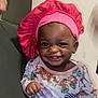 Charity joined the competition — help win amazing prizes! baby, child, smiling, pink_bonnet, animal_print, indoor, person, happy, cute, infant, portrait, clothing, face, hand, headwear, joyful, toddler, human, people, closeup