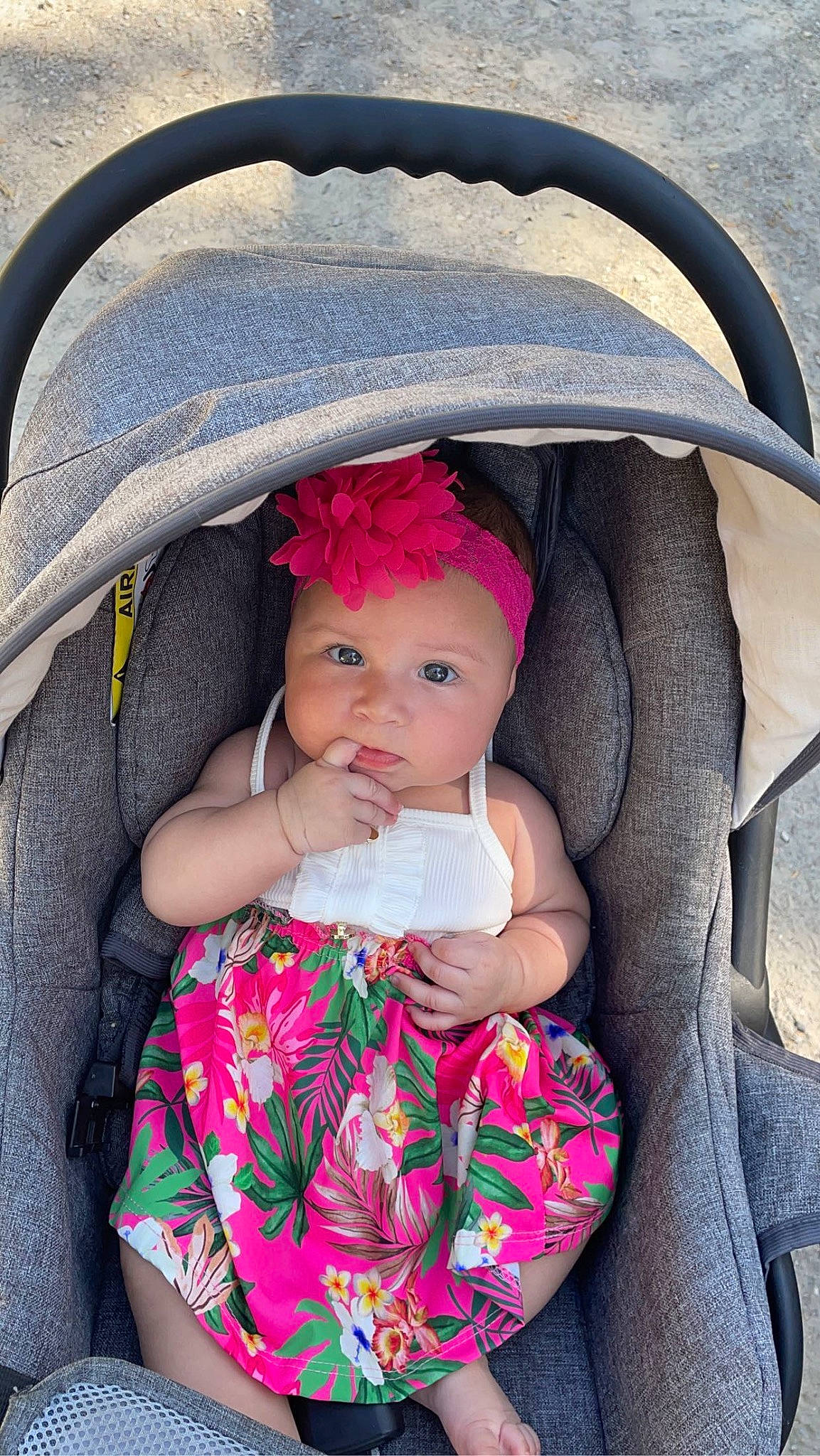 Naïla participe au concours pour gagner de l'argent avec cette photo : baby, baby_carriage, baby_toddler_clothing, cheek, child, comfort, eyebrow, eyelash, headgear, headwear, iris, lip, magenta, outerwear, person, pink, product, purple, skin, sleeve