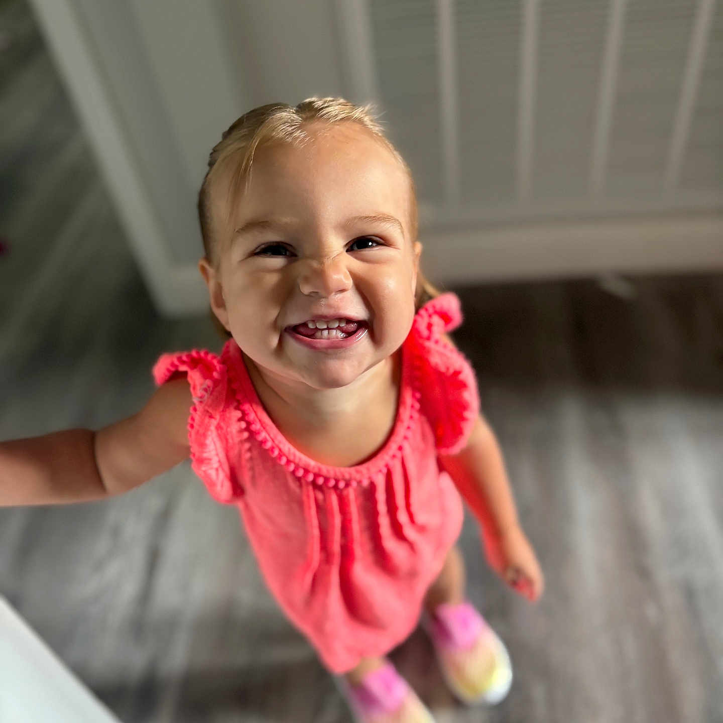 Olivia joined the competition — help win amazing prizes! bright, child, colorful_shoes, cute, dress, face, floor, hair, happy, indoor, joyful, person, pink, playful, portrait, smile, standing, toddler, wooden_floor, young_child