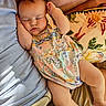Gracie joined the competition — help win amazing prizes! baby, sleeping, child, floral_dress, person, lap, pillow, patterned_pillow, rest, comfort, indoor, relaxation, cute, peaceful, skin, hand, face, head, legs, adult