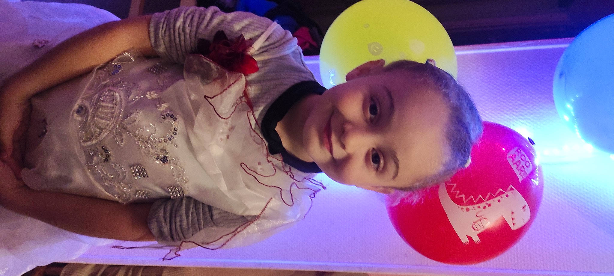 Alicia participe au concours pour gagner de l'argent avec cette photo : baby, cap, child, electric_blue, event, fashion_accessory, fun, happy, helmet, joy, leisure, magenta, pattern, person, personal_protective_equipment, pink, purple, skin, smile, toddler