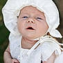 Arya joined the competition — help win amazing prizes! baby, infant, white_bonnet, white_dress, embroidery, lace, outdoor, portrait, cute, child, face, headwear, young, person, closeup, skin, expression, sunlight, summer, soft_light