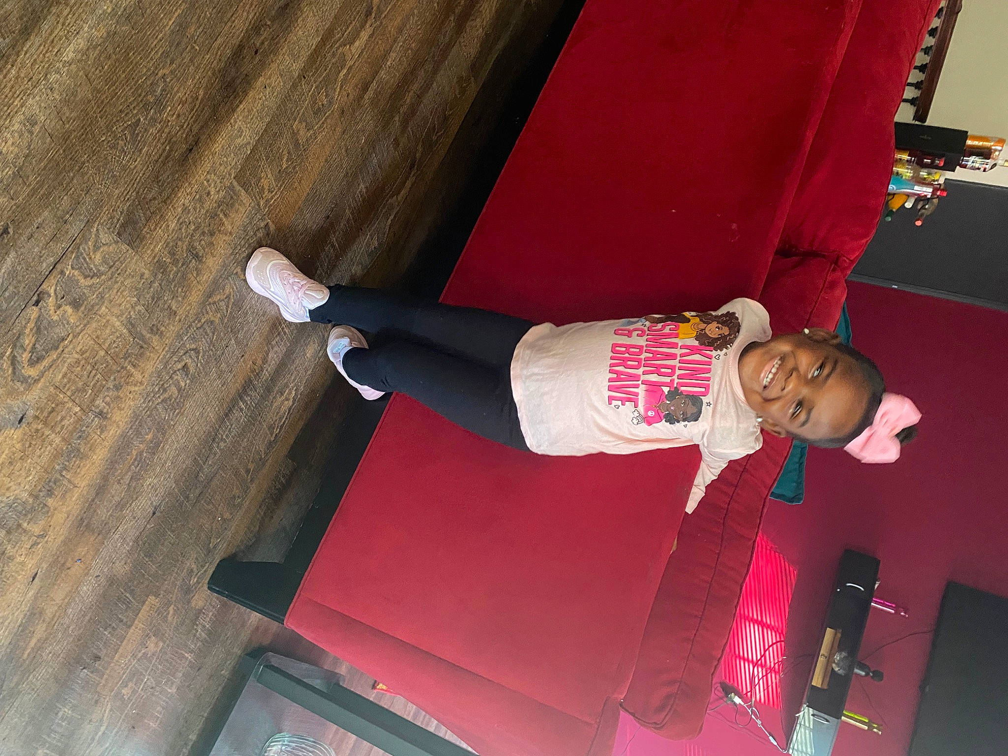 Alaiya joined the competition — help win amazing prizes! elbow, flooring, fun, hardwood, human_leg, joy, knee, magenta, person, plywood, room, sleeve, smile, sneakers, sportswear, t_shirt, table, thigh, toddler, walking_shoe