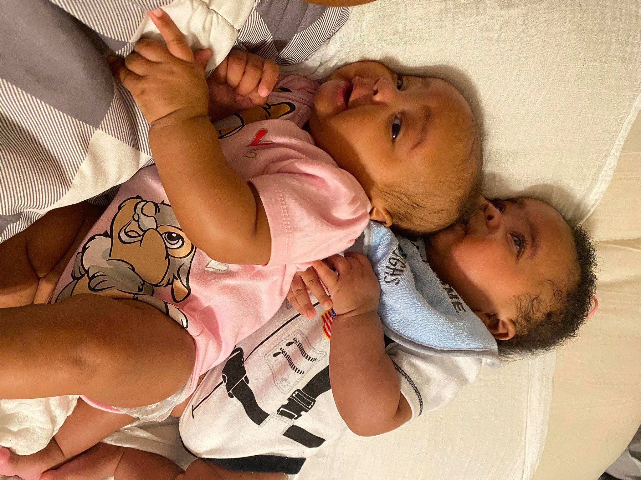 Nyla is registered to the contest to win money with this photo: arm, baby, baby_toddler_clothing, cheek, child, comfort, eyelash, finger, gesture, hand, happy, hat, mouth, nail, neck, nose, people, person, skin, thumb