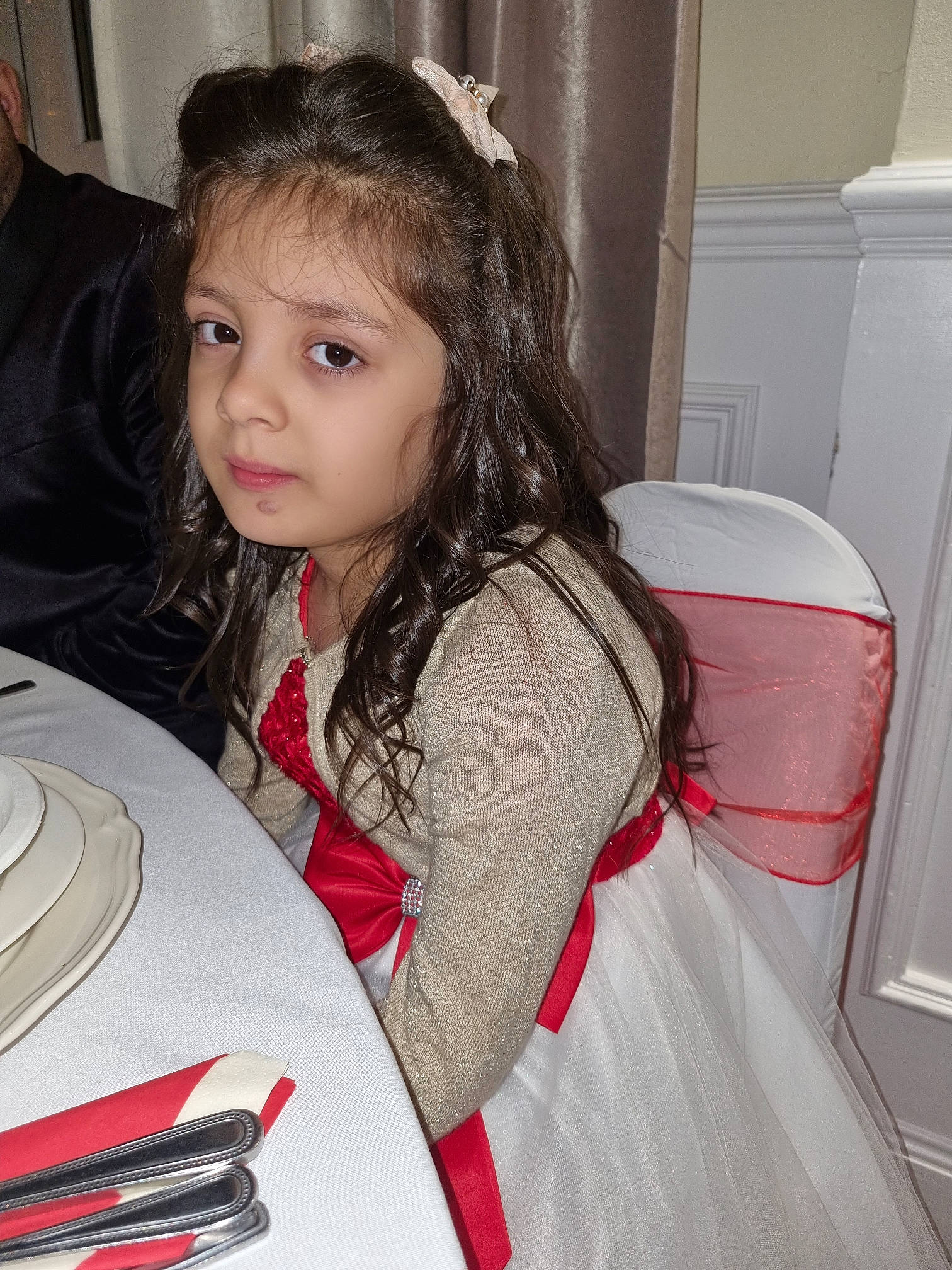 Alisha joined the competition — help win amazing prizes! carmine, chair, child, christmas, comfort_food, desk, event, fork, headband, headpiece, kitchen_utensil, knife, party, pen, person, plate, room, sitting, table, tableware