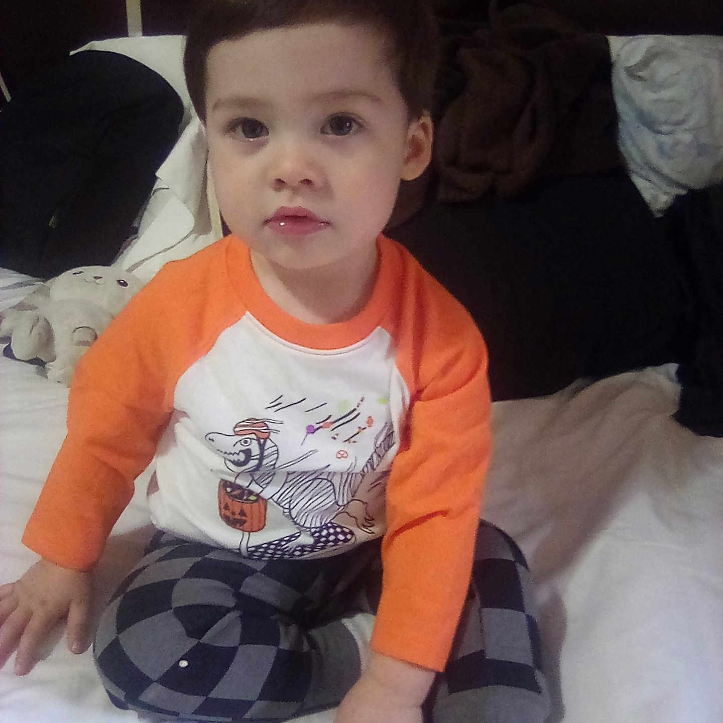 Noah joined the competition — help win amazing prizes! bed, bedroom, boy, child, clothing, couch, cushion, electronics, face, furniture, head, homedecor, indoors, male, person, photography, portrait, room, sitting, t_shirt