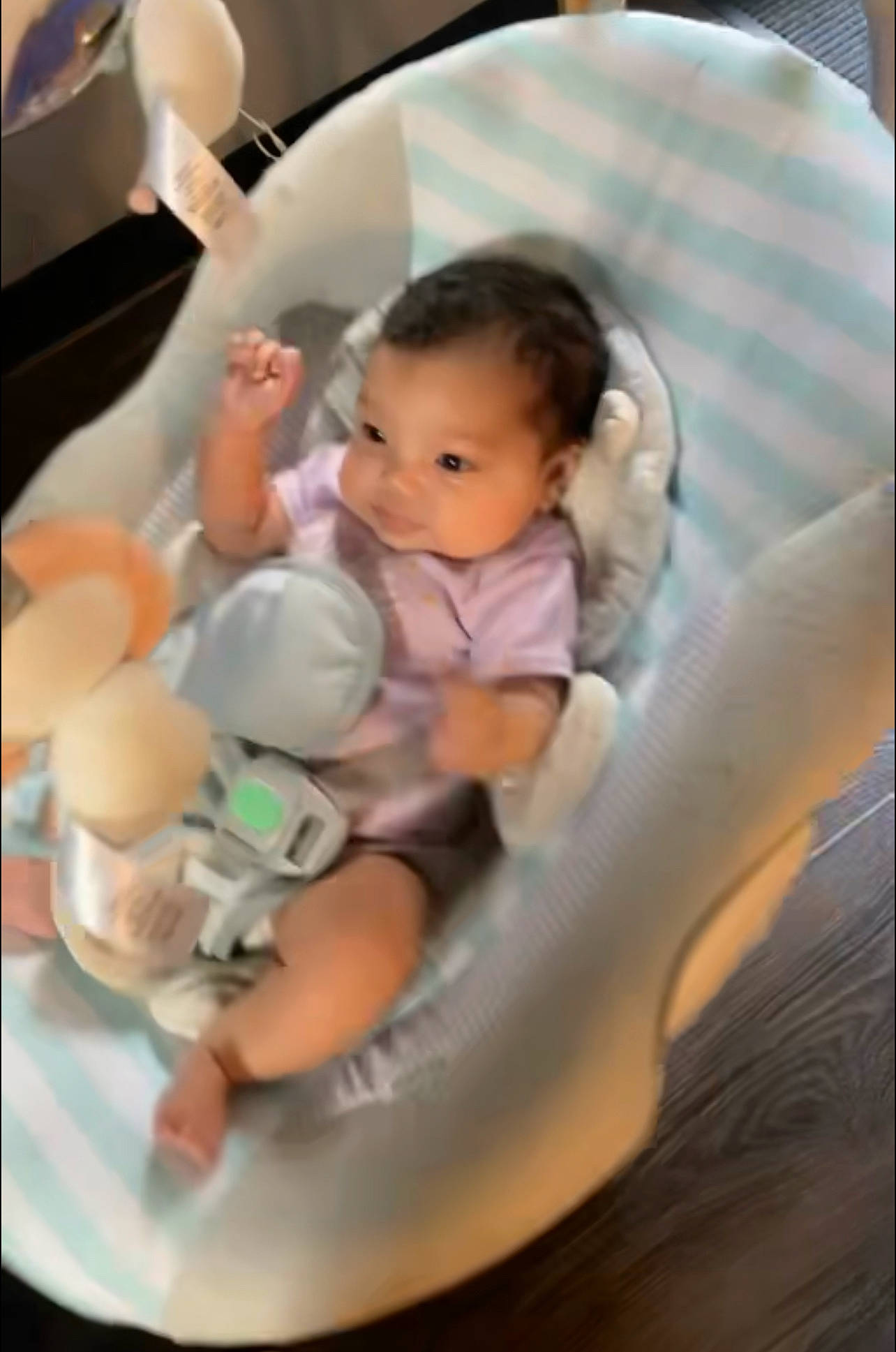 Takara is registered to the contest to win money with this photo: auto_part, baby, baby_carriage, baby_in_car_seat, baby_products, baby_safety, baby_toddler_clothing, car_seat, cheek, child, circle, comfort, finger, flash_photography, fun, happy, person, room, sitting, thumb