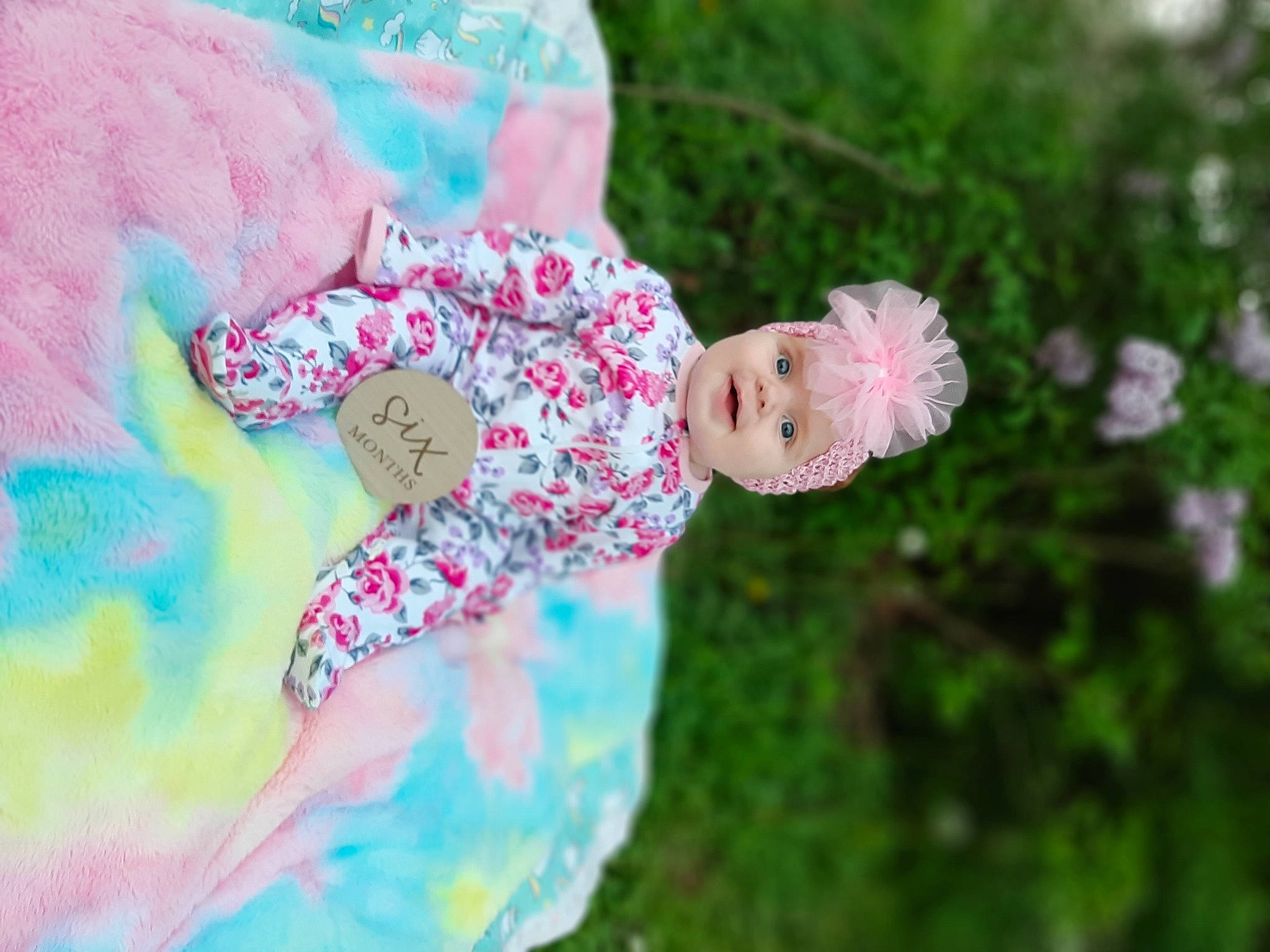 Legacie is registered to the contest to win money with this photo: doll, event, fawn, fun, grass, happy, headwear, leaf, leisure, pattern, people_in_nature, person, petal, pink, plant, sky, spring, toddler, toy, tree